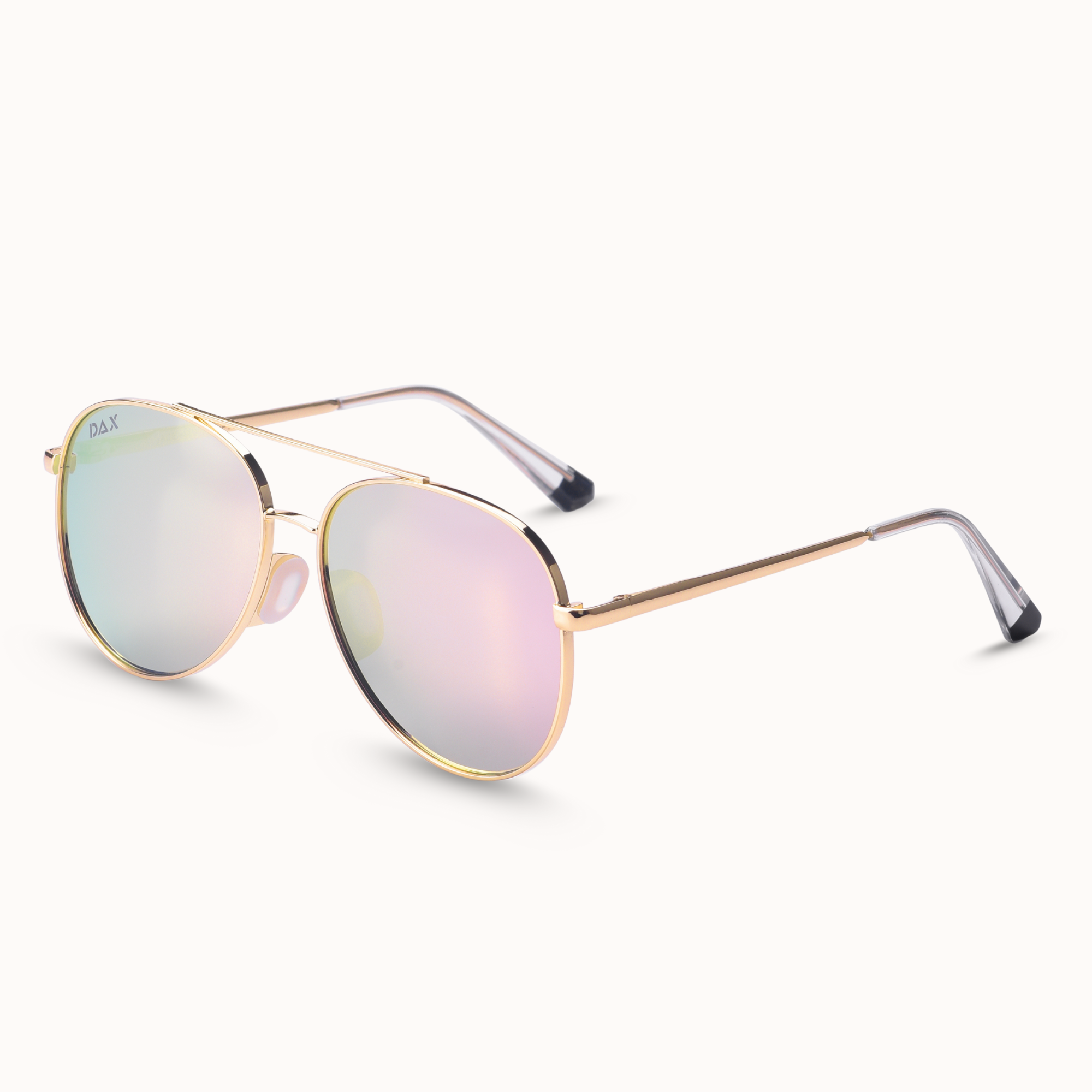 Gold-framed sunglasses with pink-tinted lenses on a white background