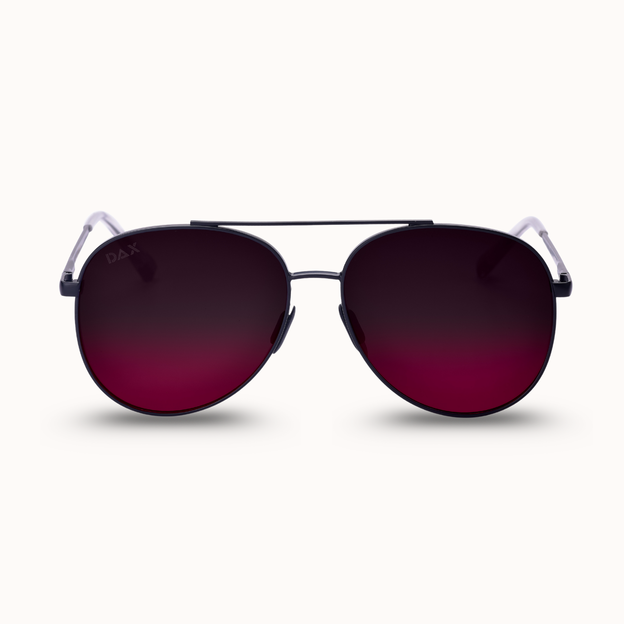 Sunglasses with red gradient lenses and metal frame on a white background