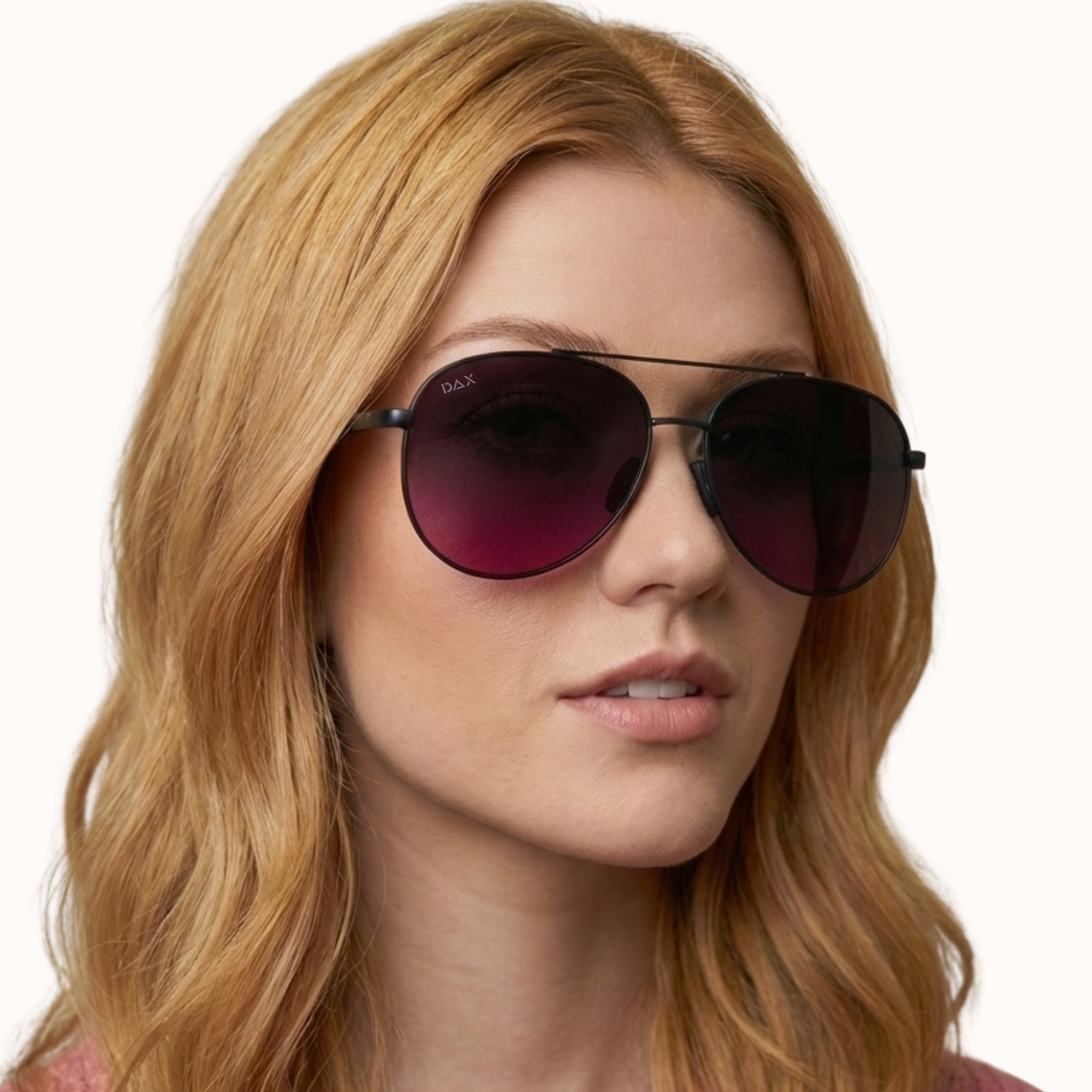 Woman wearing dark sunglasses with a plain background