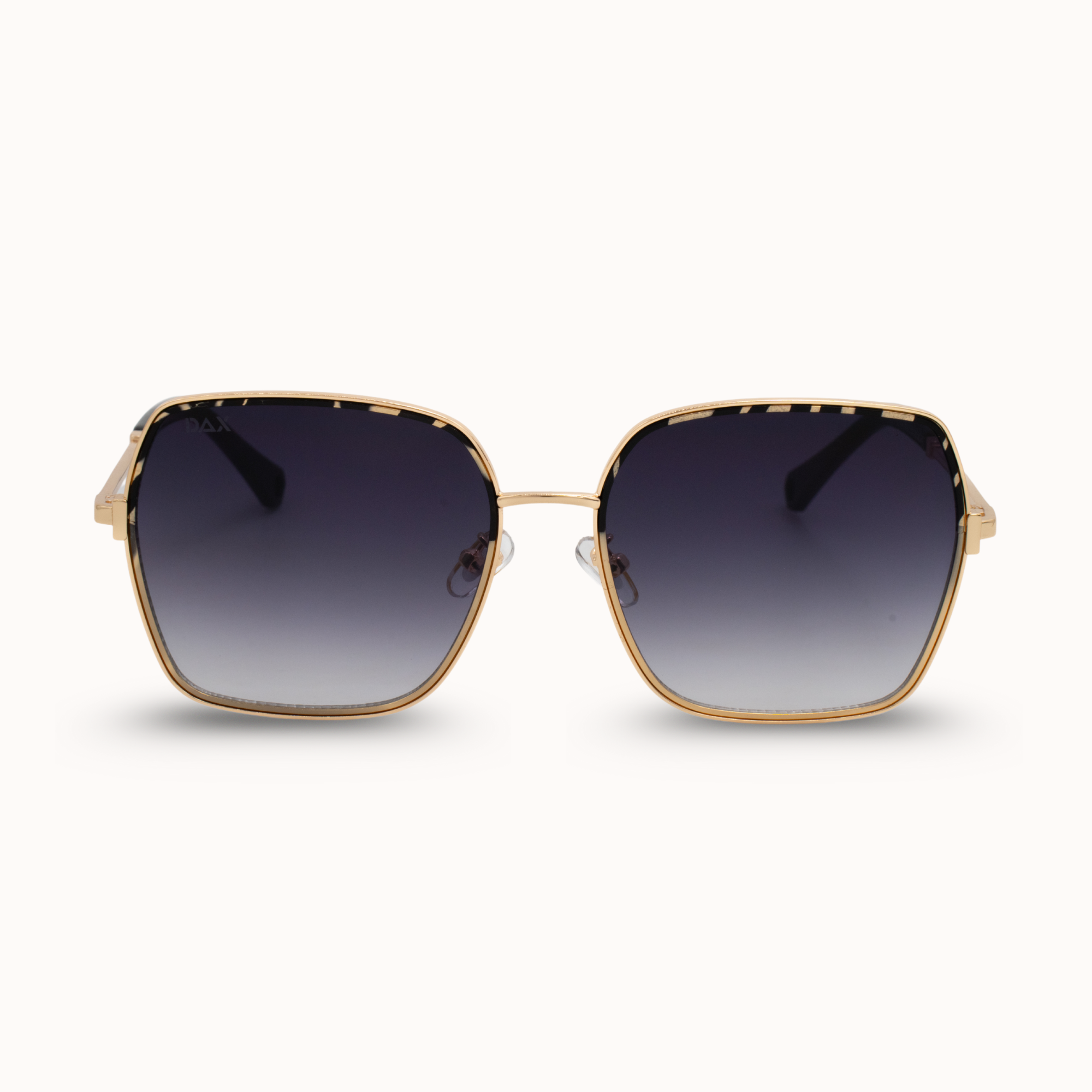 Gold-framed sunglasses with gradient lenses on a white background