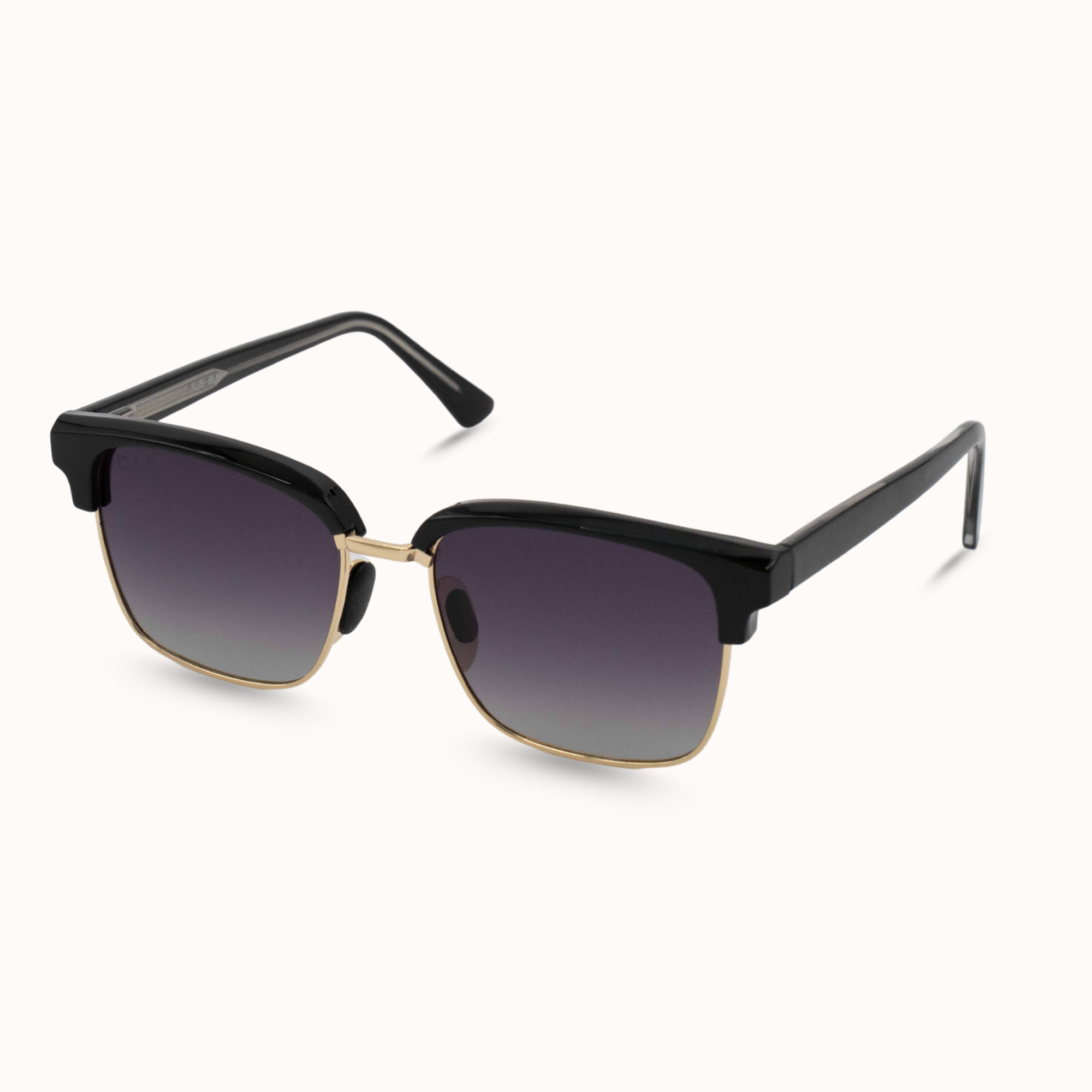 Black sunglasses with gold accents on a white background