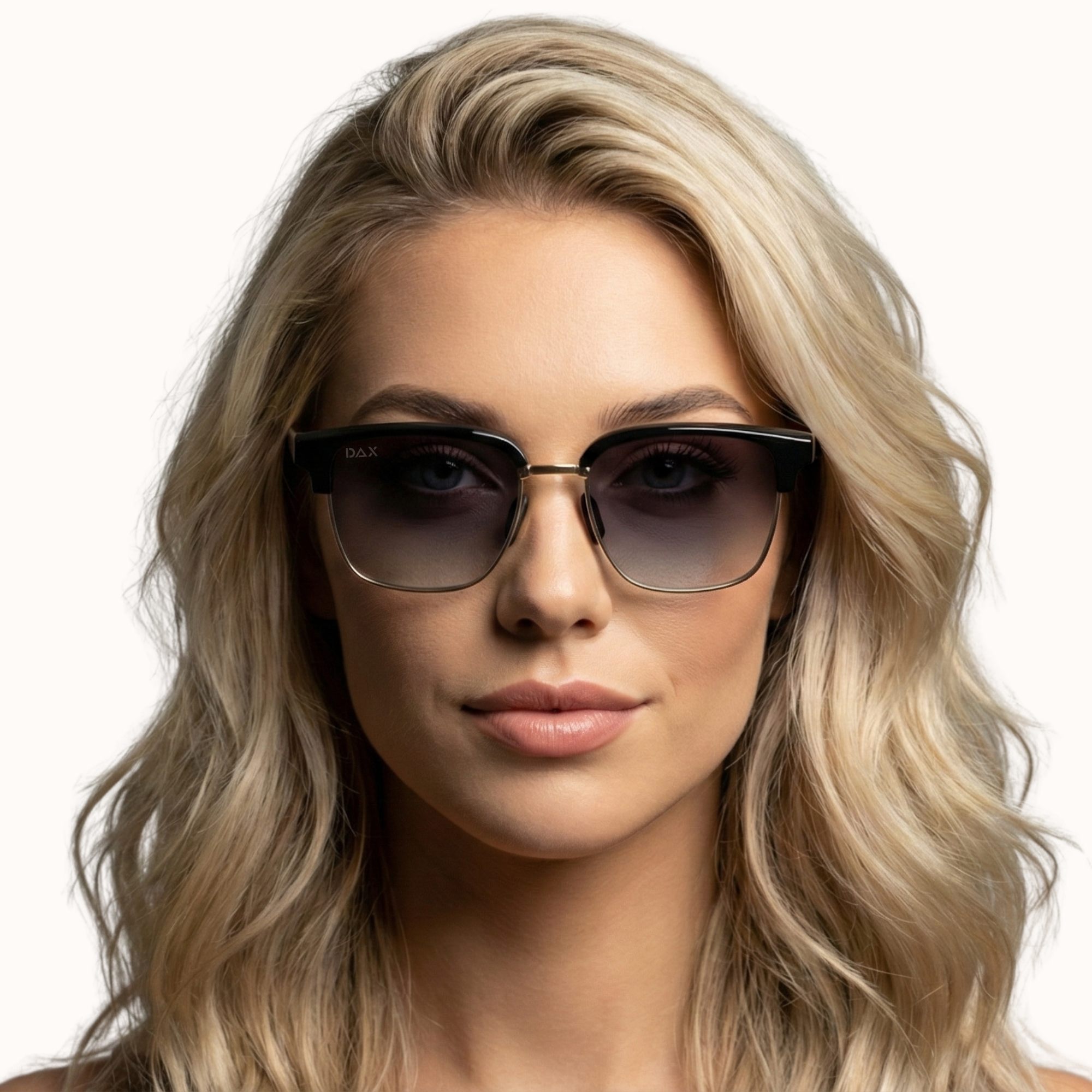 Woman wearing sunglasses with a neutral background