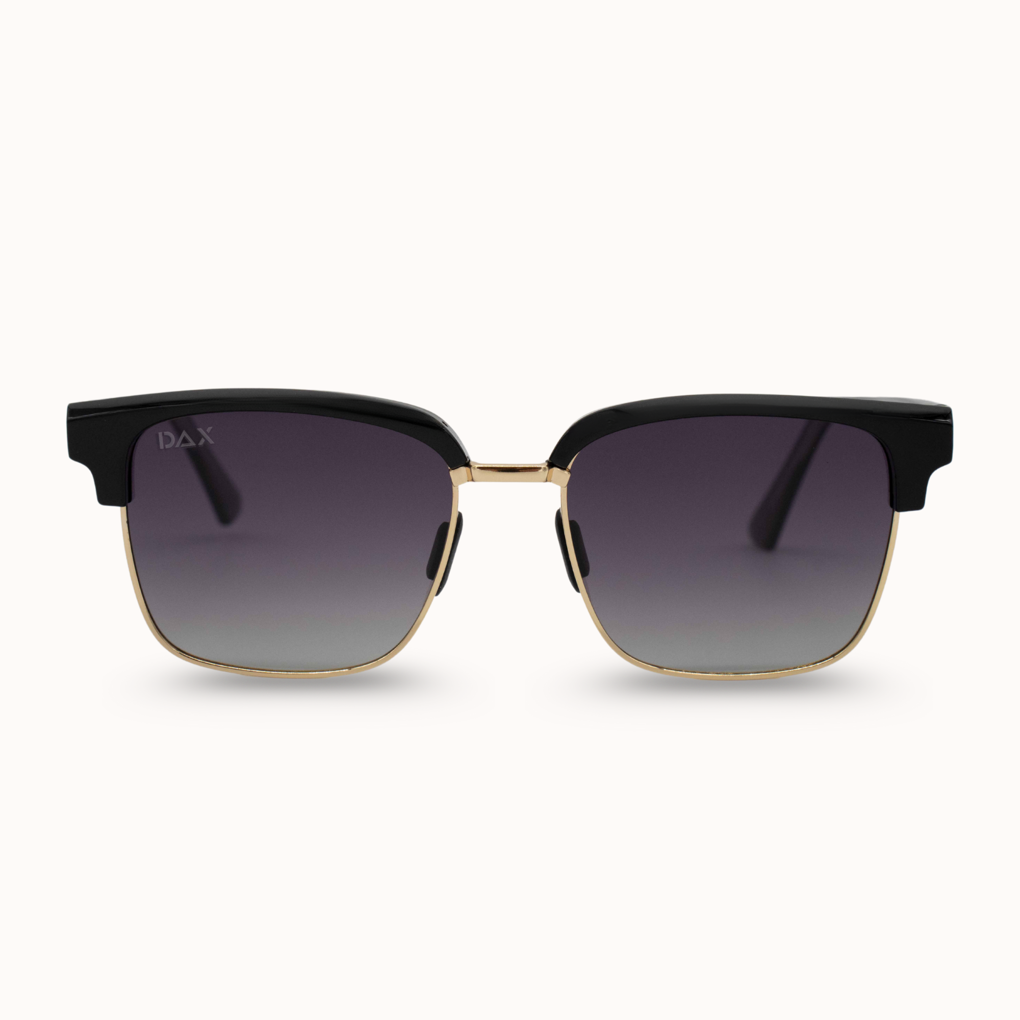 Sunglasses with black and gold frame on a white background