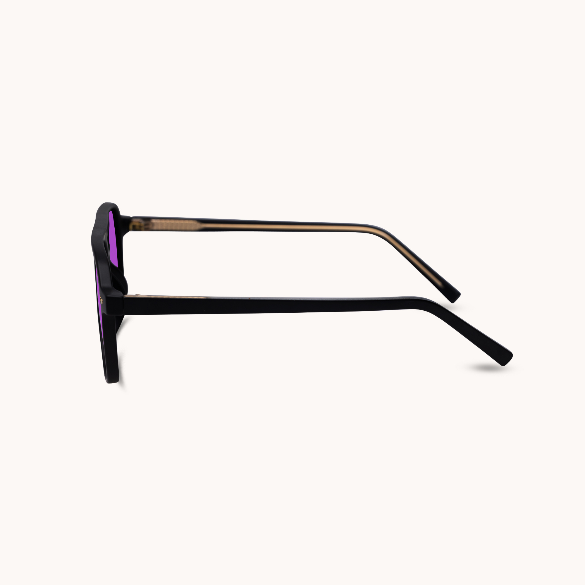 Black sunglasses with a purple lens on a white background