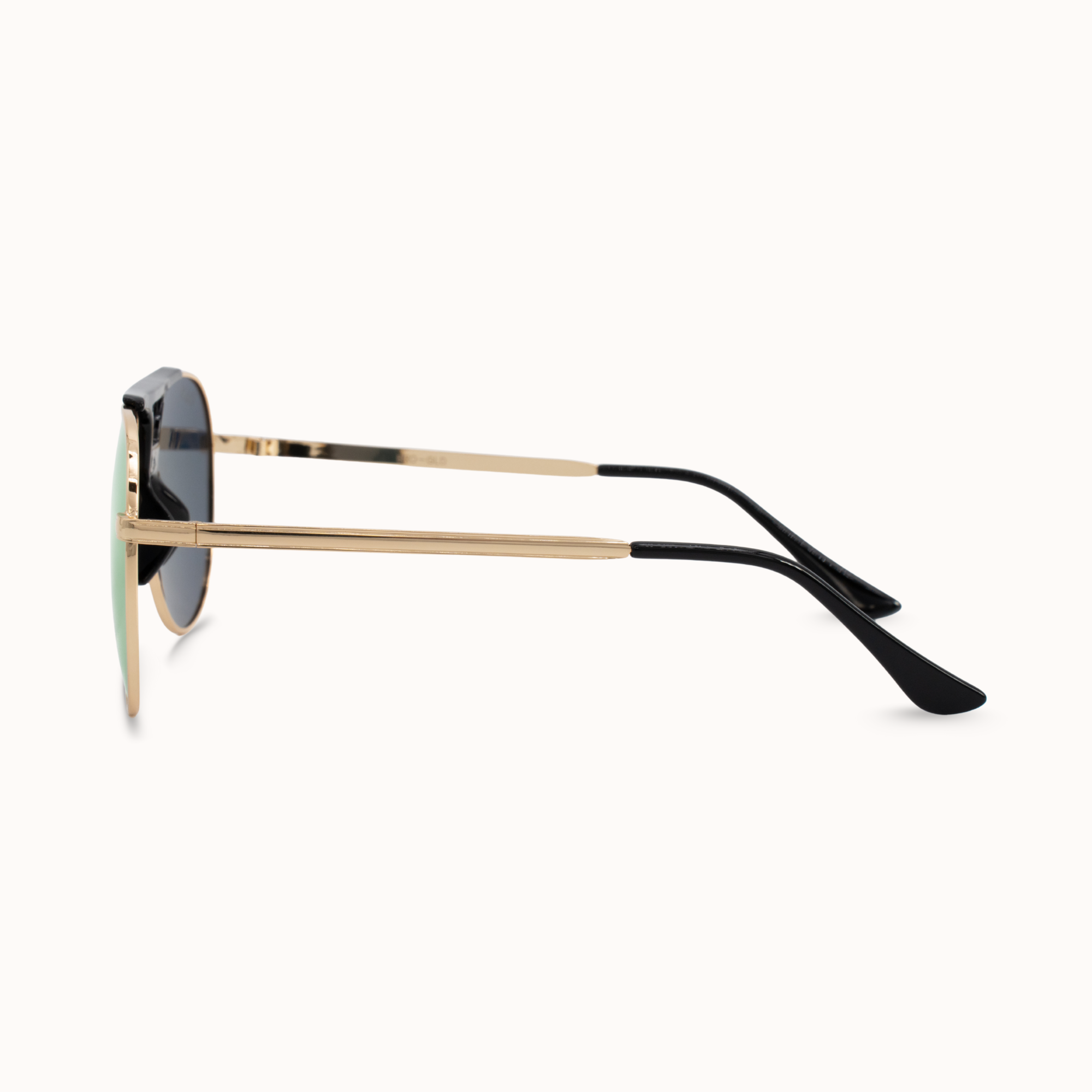 Sunglasses with gold frame and black arms on a white background