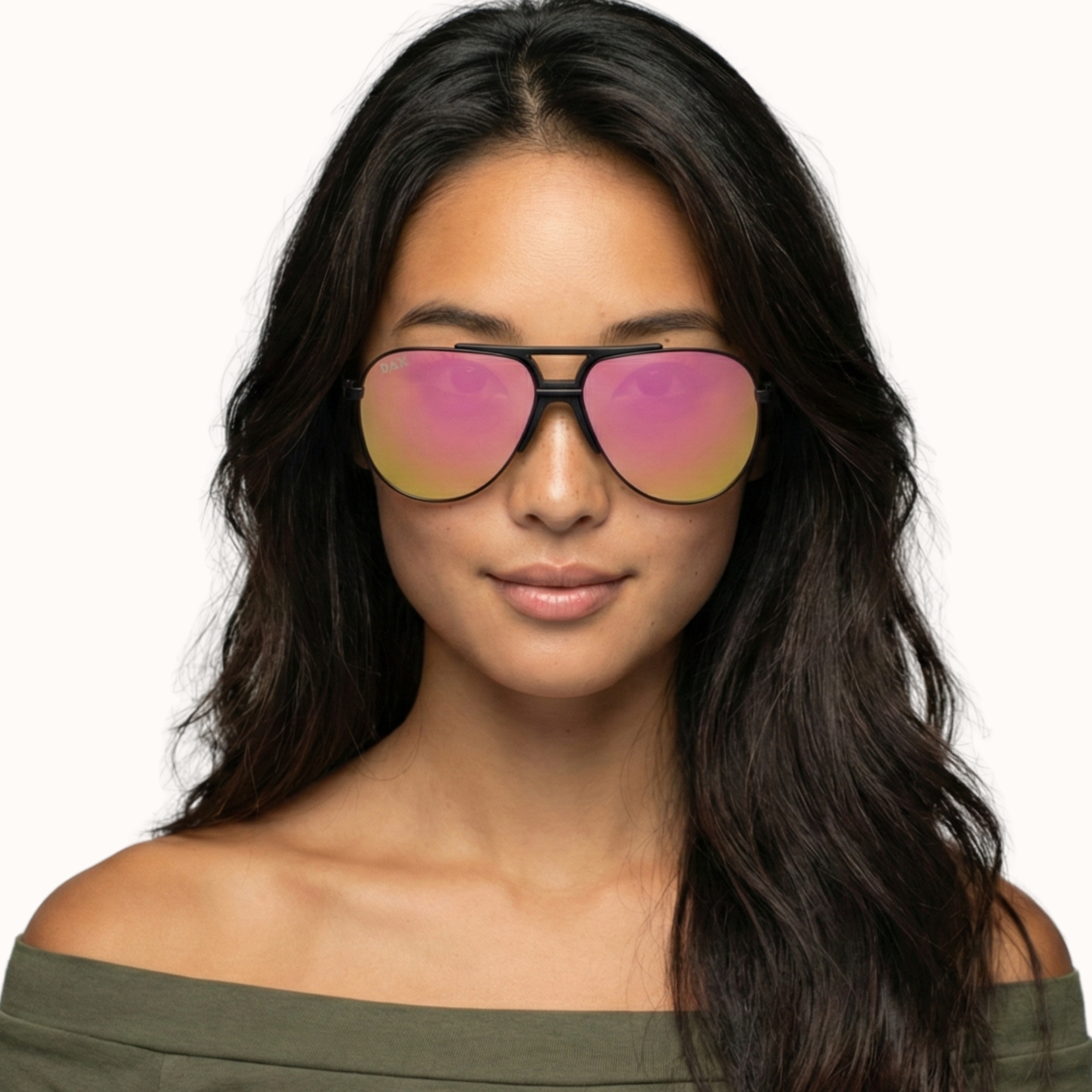 Woman wearing pink-tinted sunglasses with a plain background