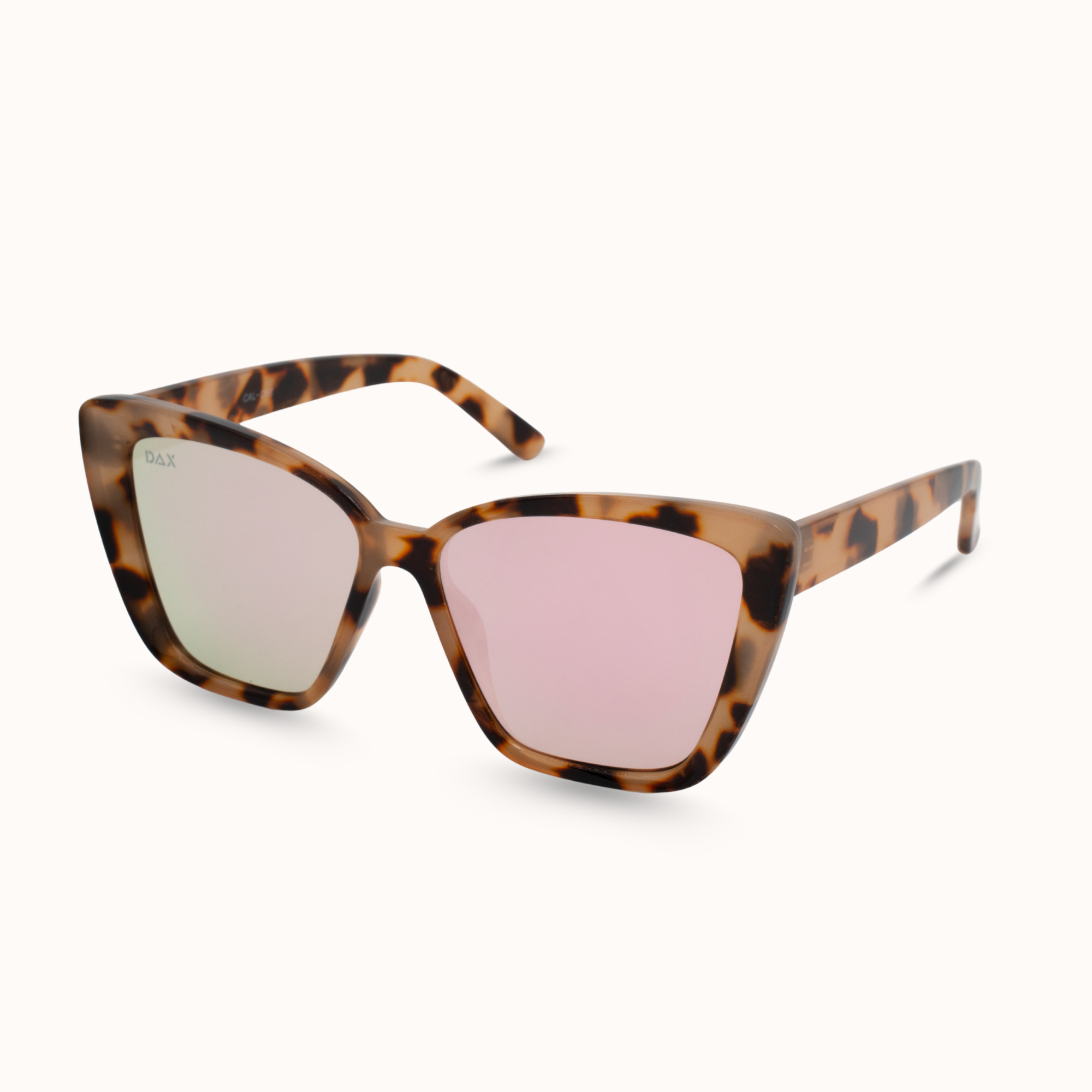 Sunglasses with tortoiseshell frame and pink lenses on a white background