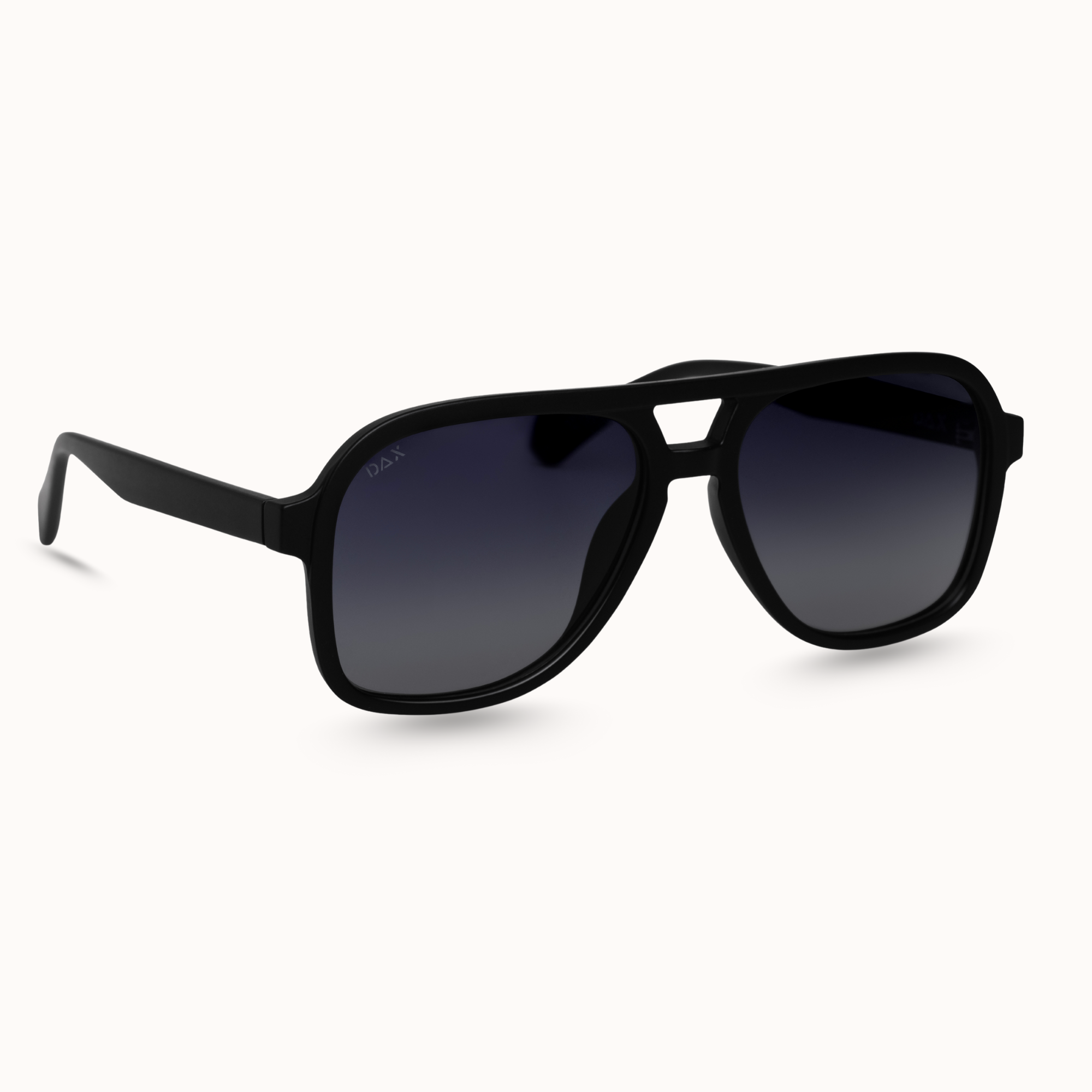 Black sunglasses with gradient lenses on a white background