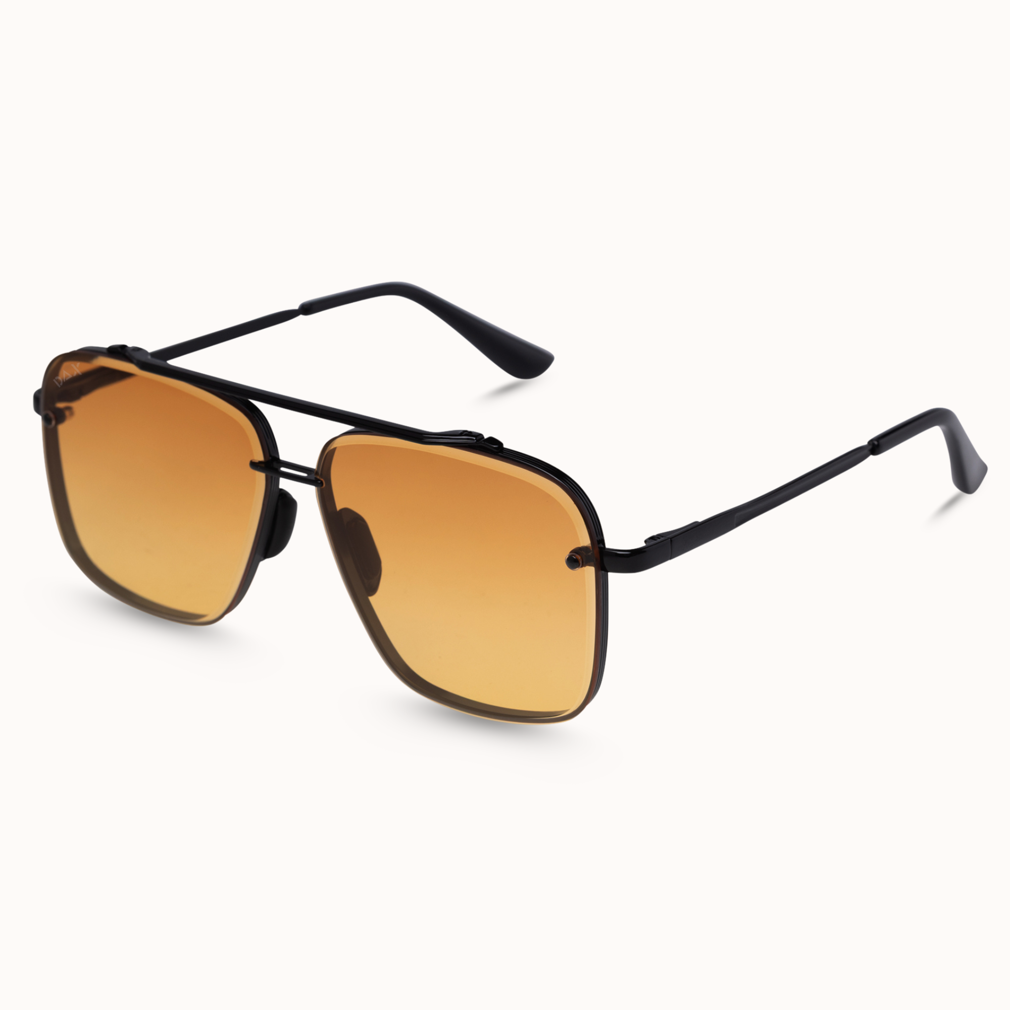 Black metal aviator-style sunglasses with gradient amber-orange lenses, shown at a three-quarter angle on a clean off-white background.