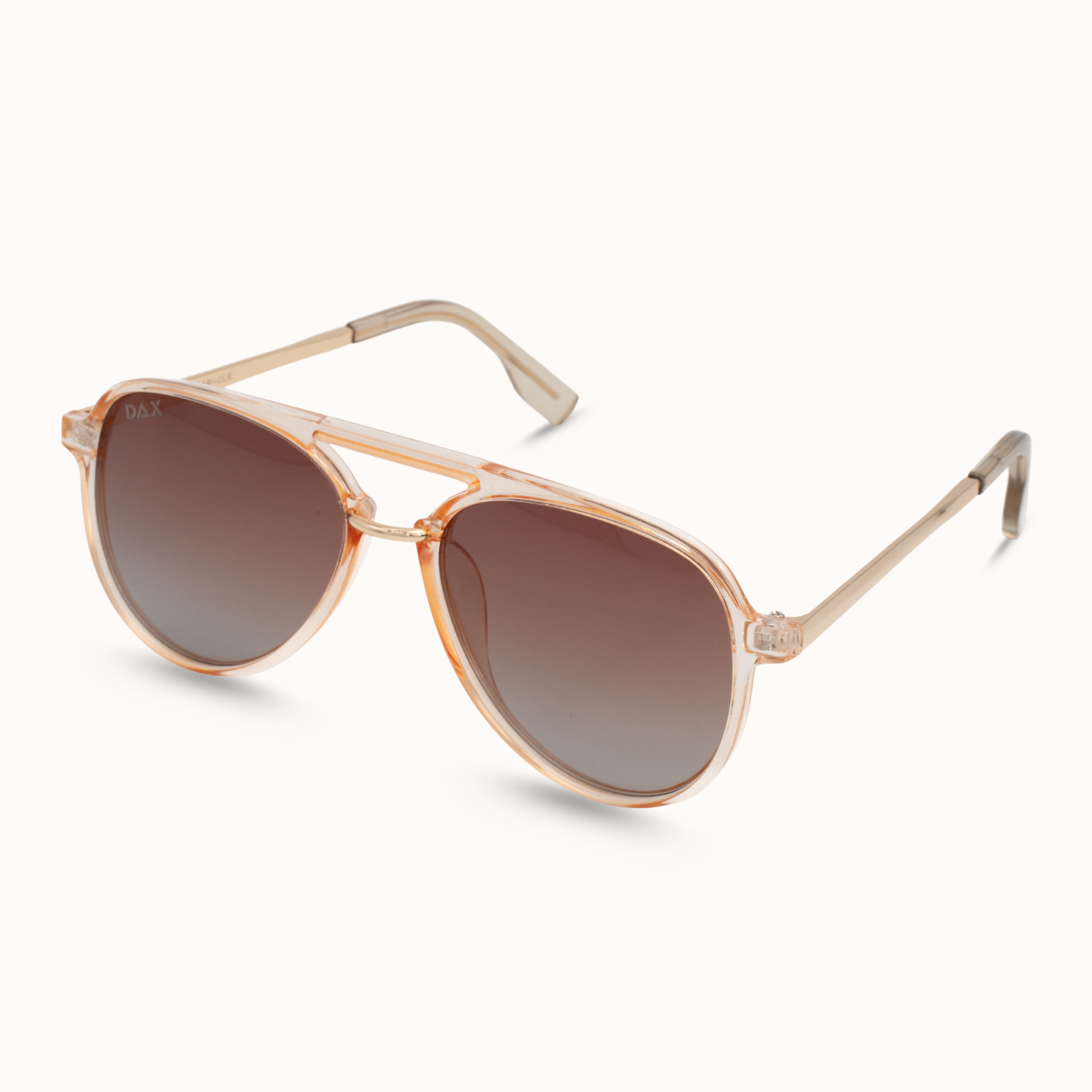 Gold-framed sunglasses with brown gradient lenses on a white background