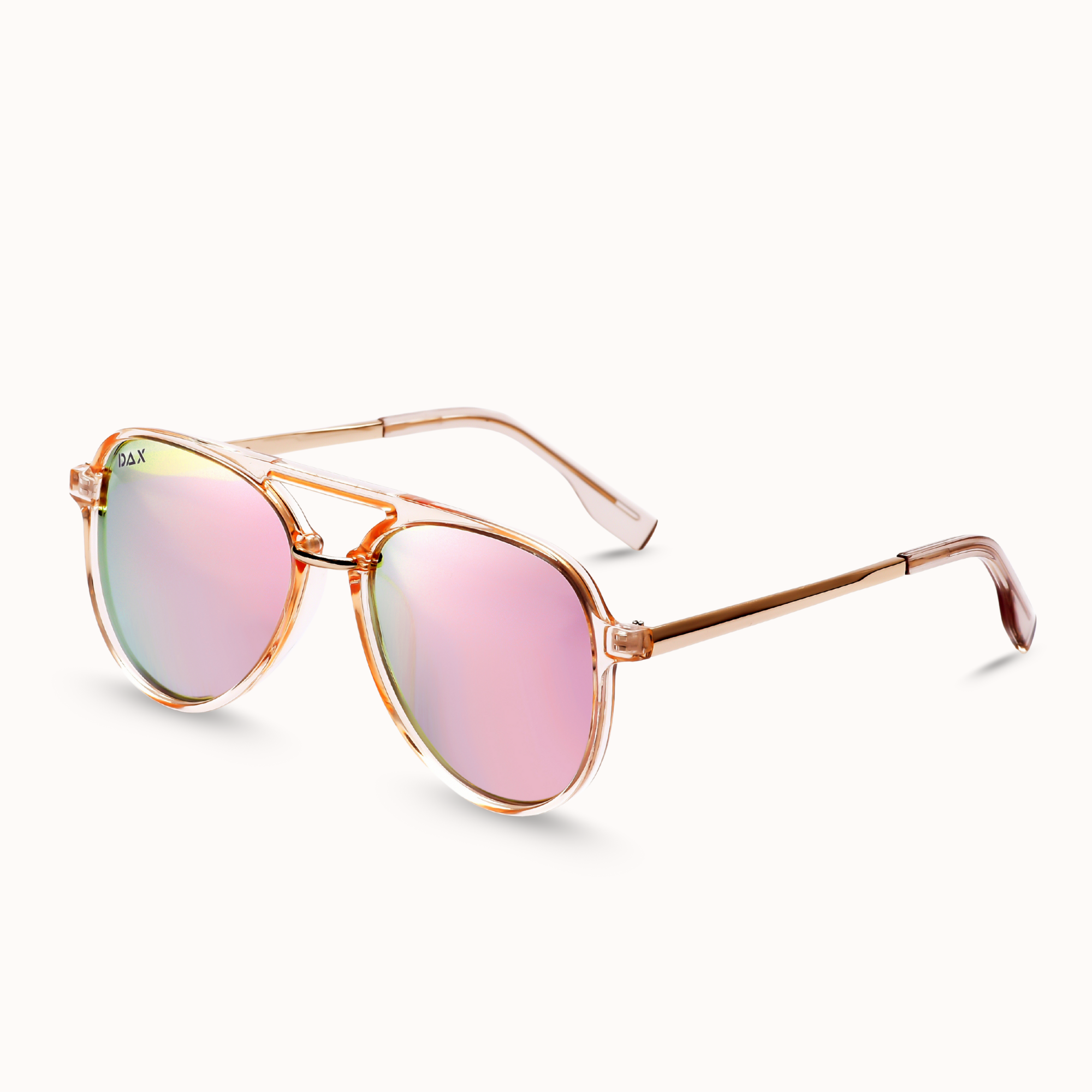 Sunglasses with pink lenses and gold frame on a white background