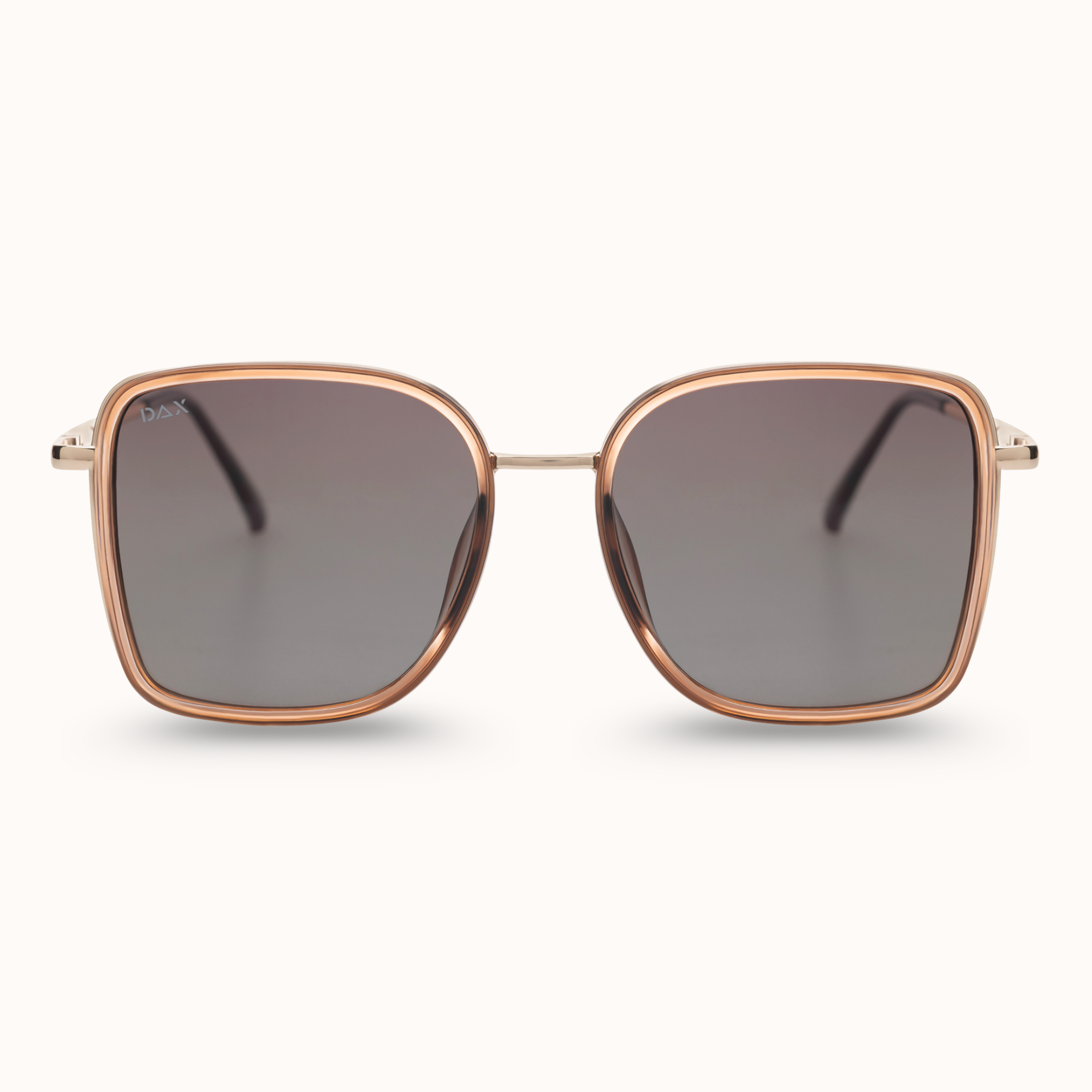 Sunglasses with rose gold frame and dark lenses on a white background