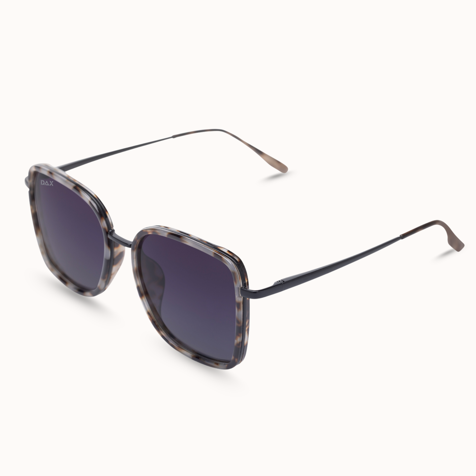 Sunglasses with tortoiseshell frame and dark lenses on a white background