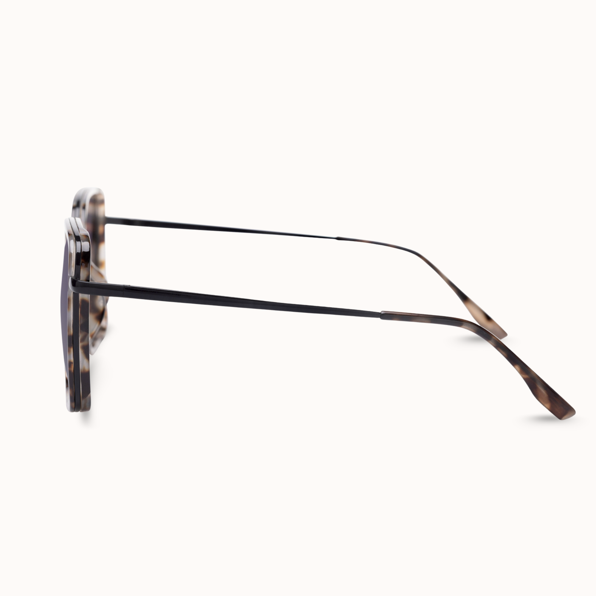 Sunglasses with tortoiseshell frame on a white background