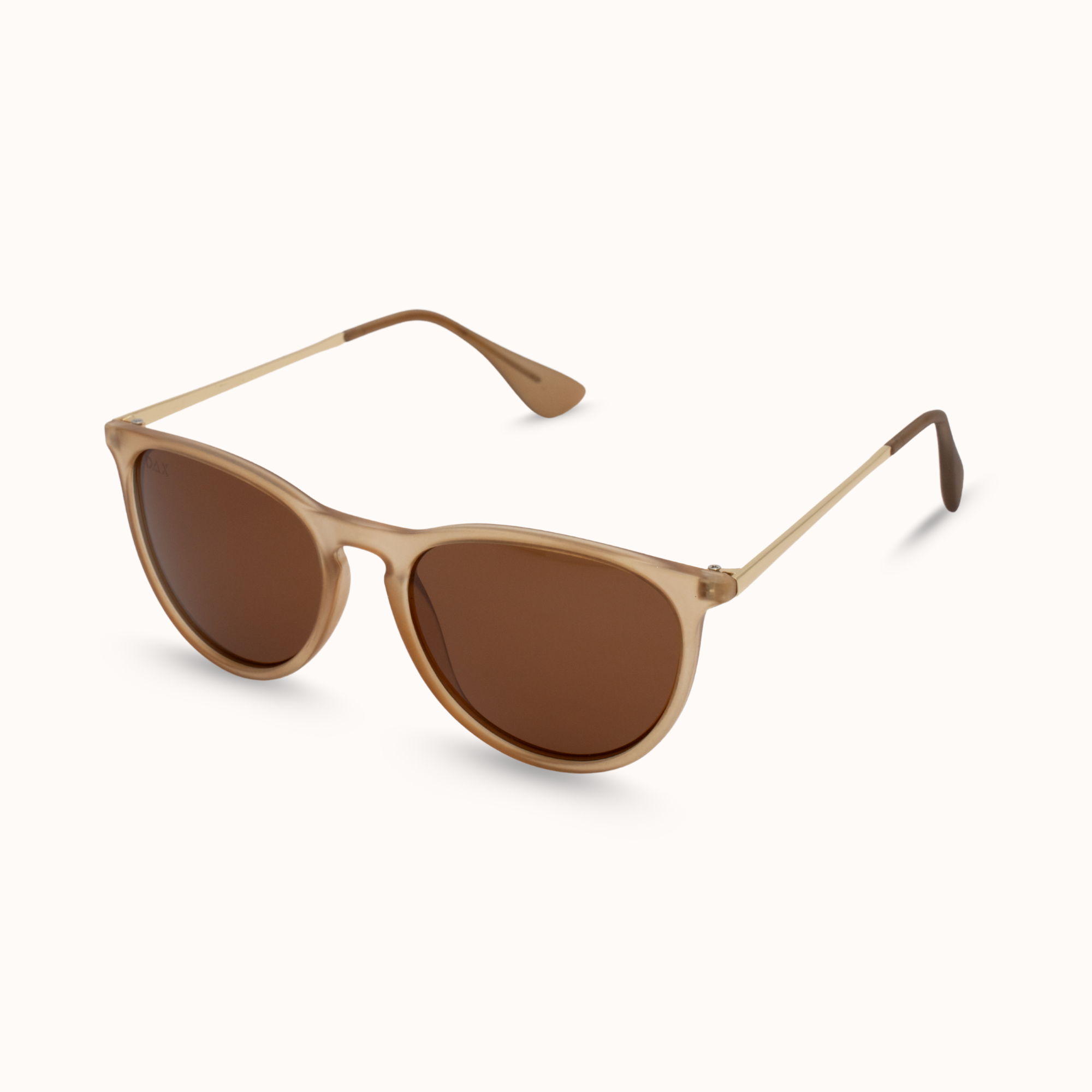 Beige sunglasses with brown lenses on a white background