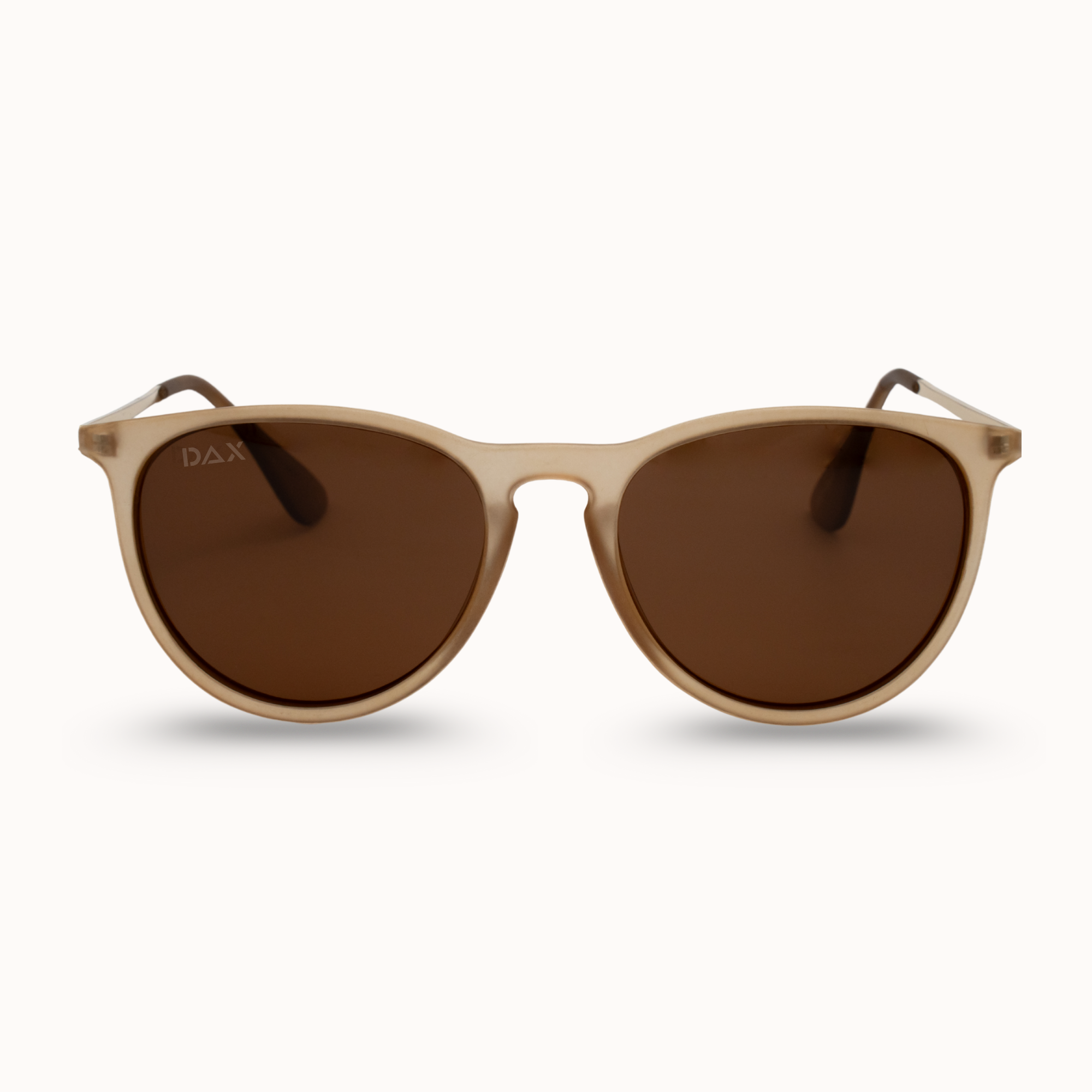 Beige sunglasses with brown lenses on a white background