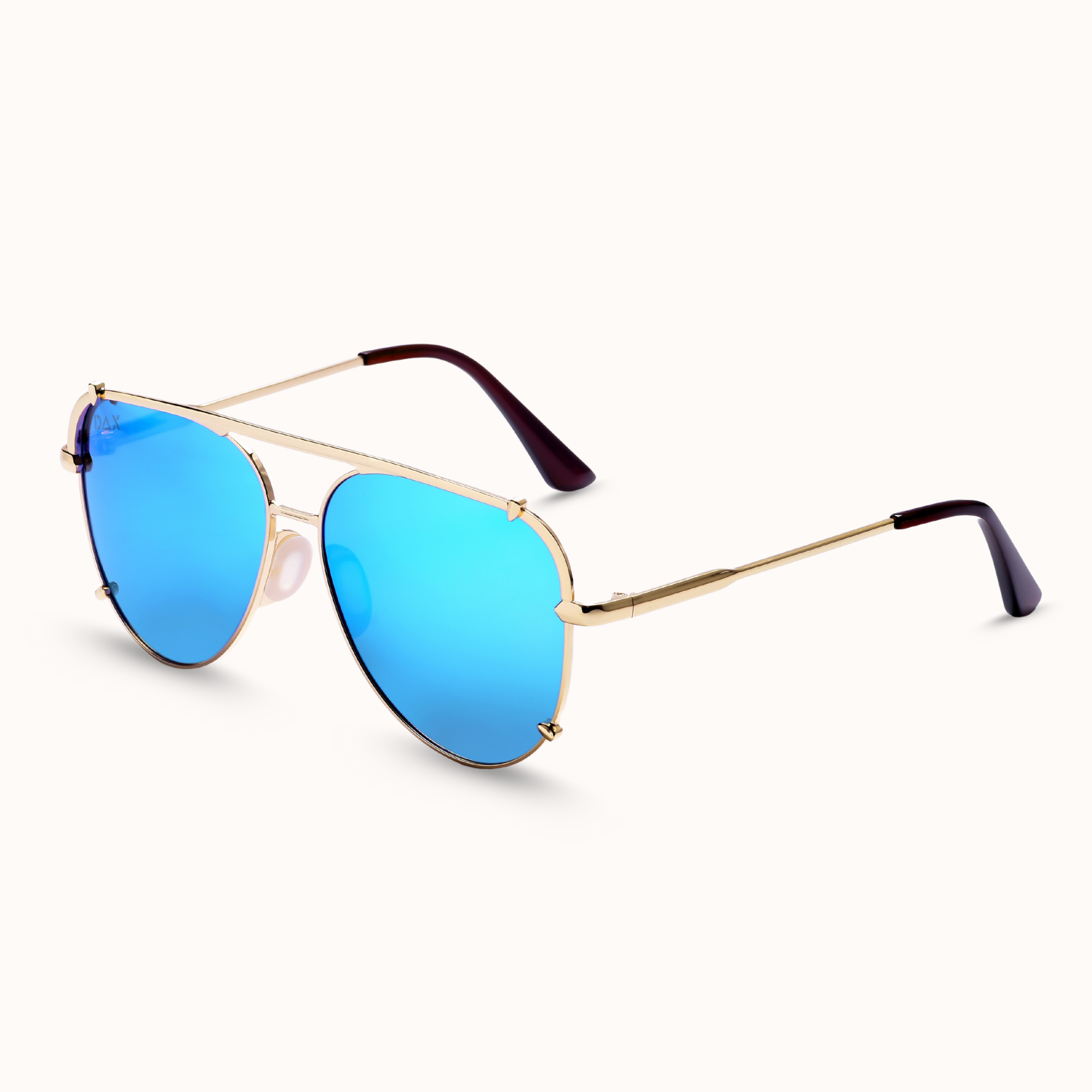 Sunglasses with blue lenses and gold frames on a white background