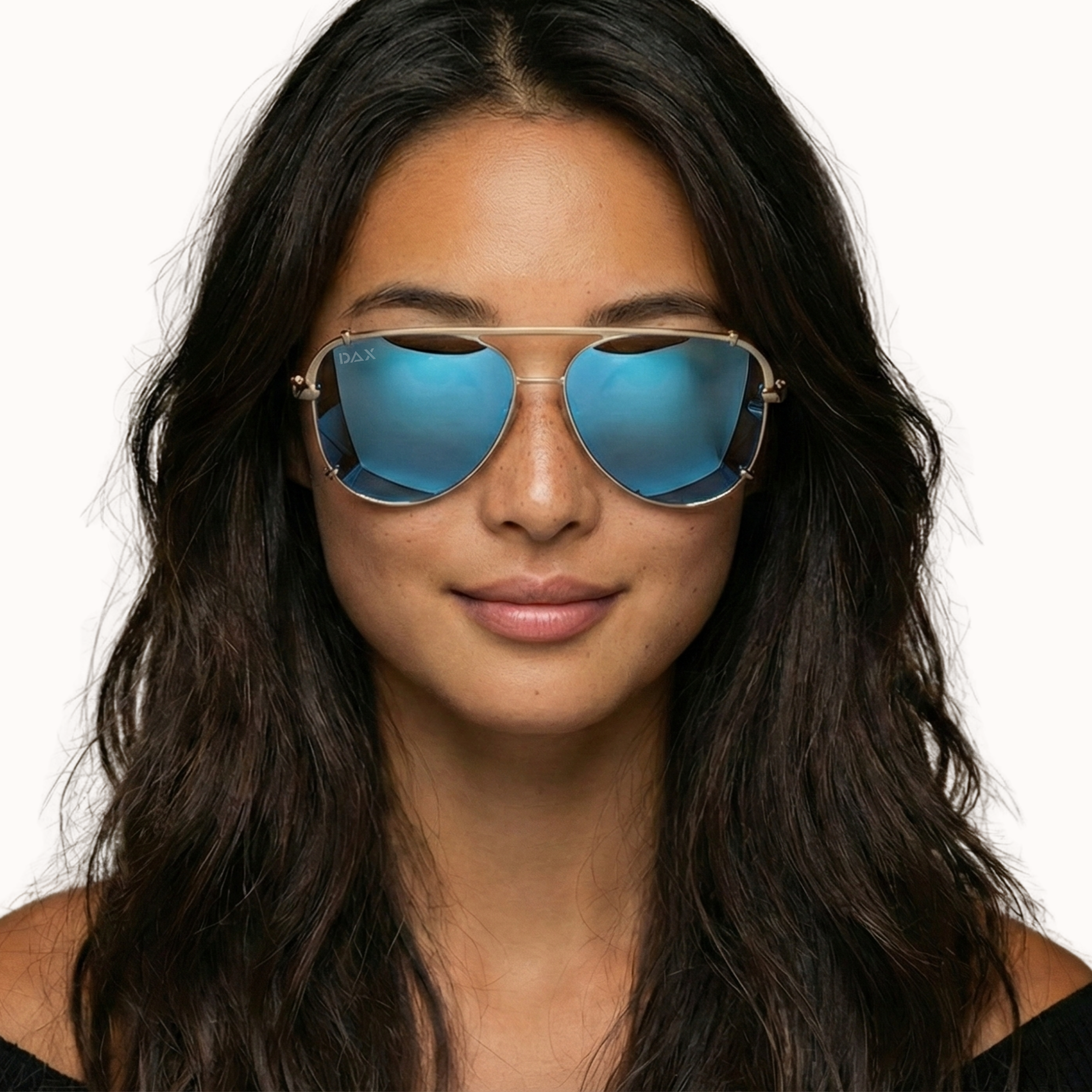 Woman wearing blue reflective sunglasses on a white background