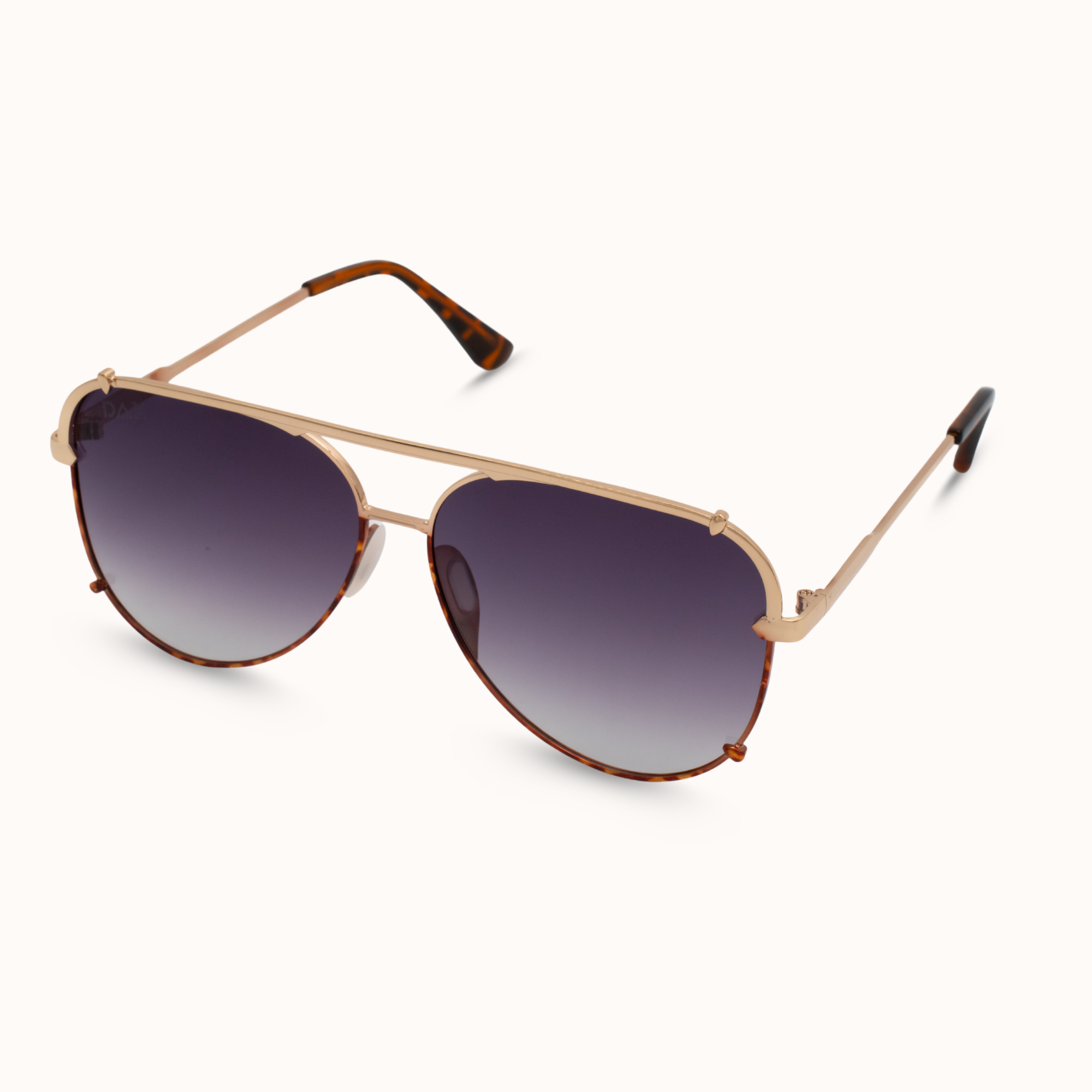 Aviator sunglasses with gold frame and dark gradient lenses on a white background