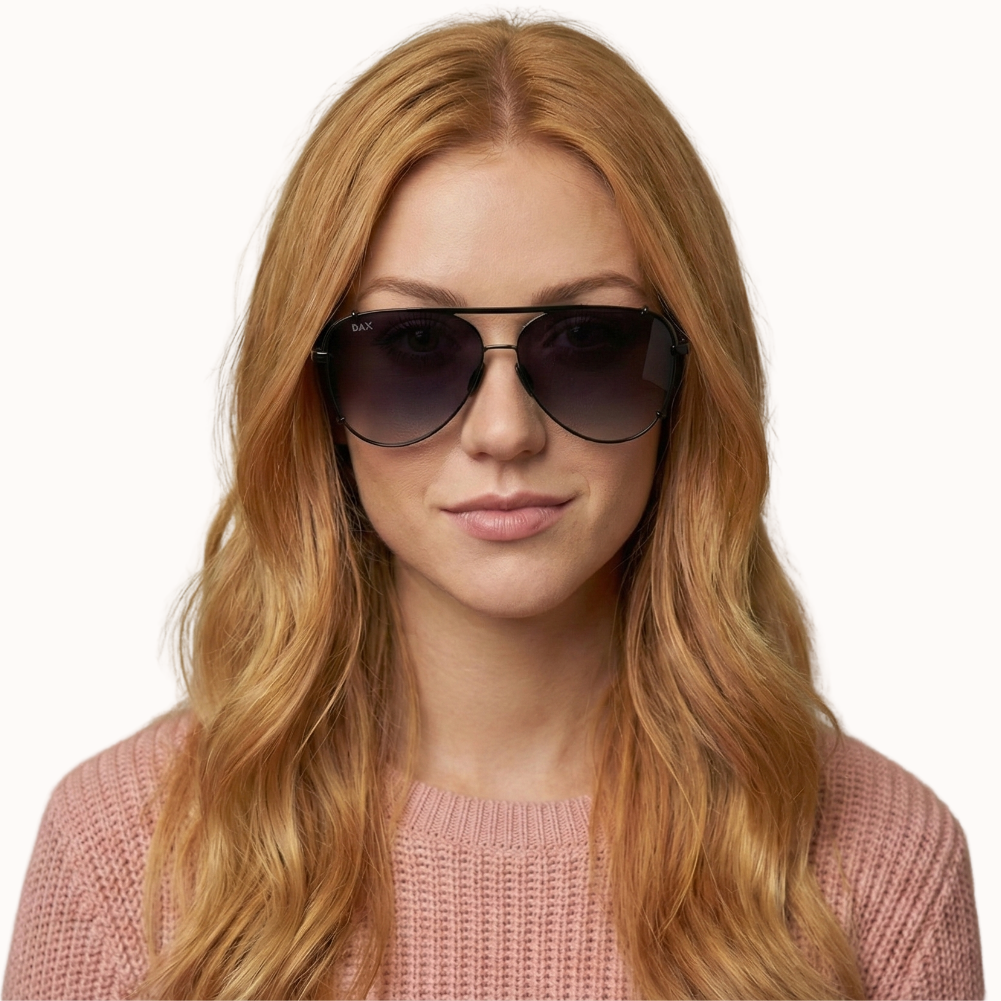 Woman wearing dark sunglasses with a plain background