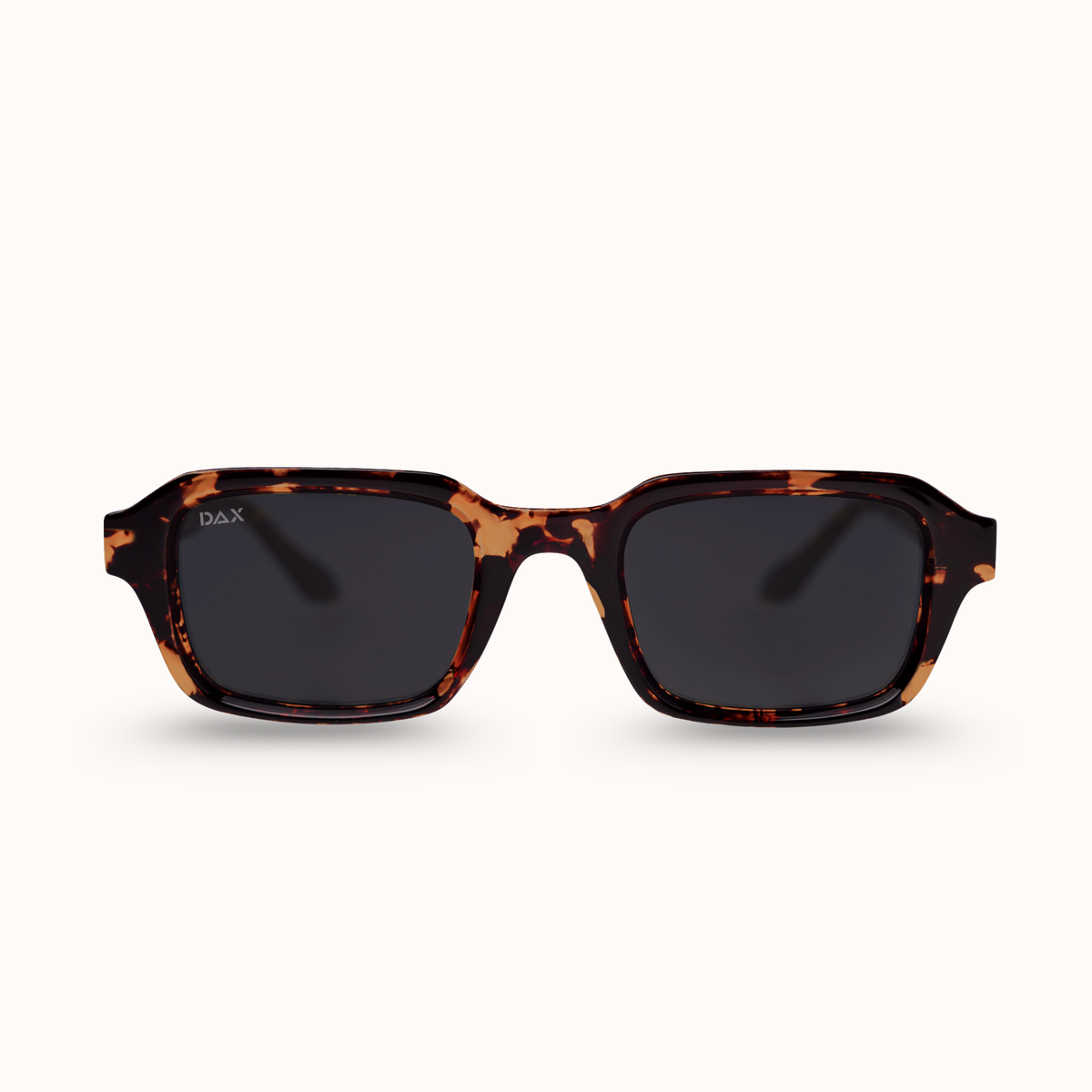 A pair of D&X square sunglasses with a dark brown and black tortoiseshell frame and dark lenses, shown against a plain off-white background.