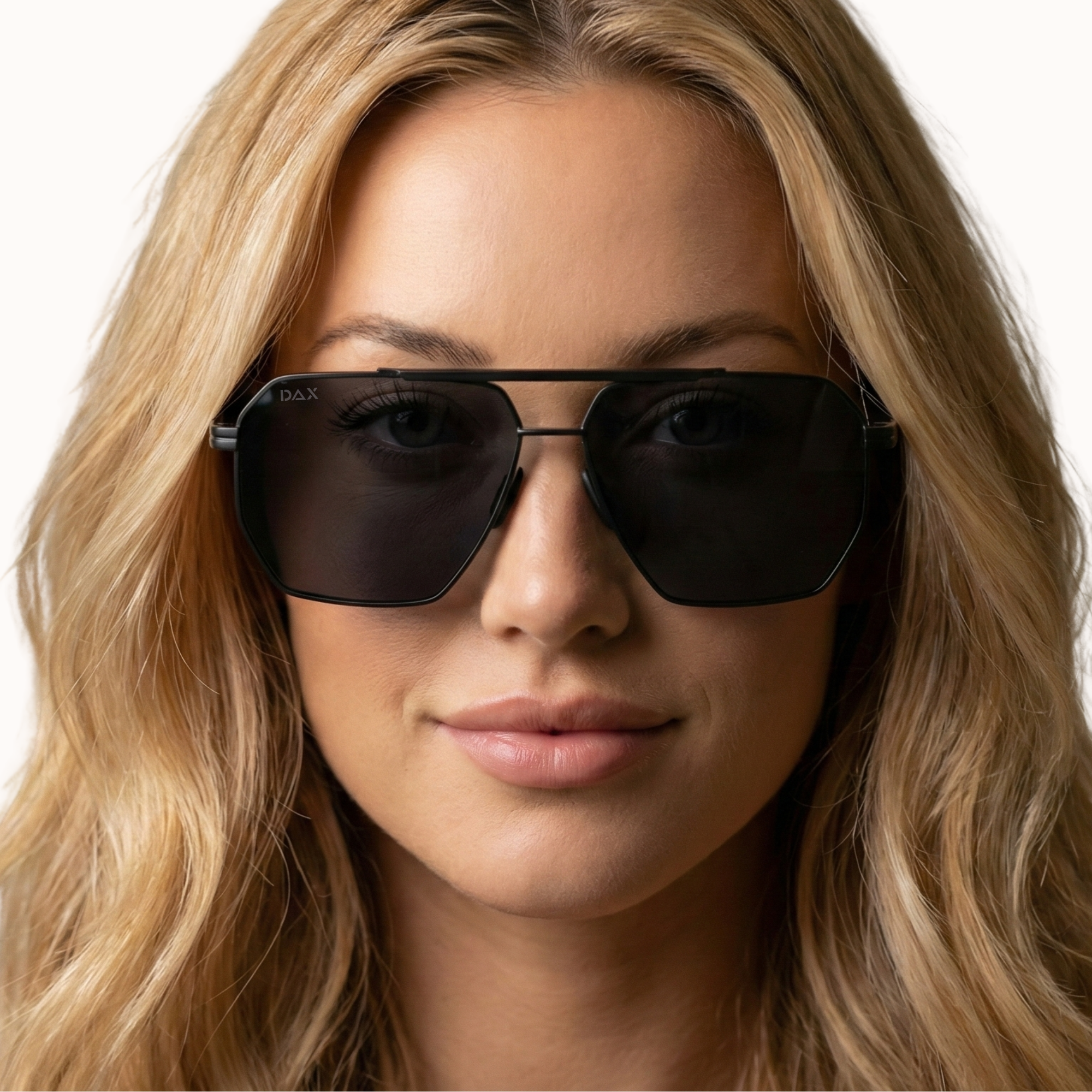 Woman wearing AXL black sunglasses with a neutral background