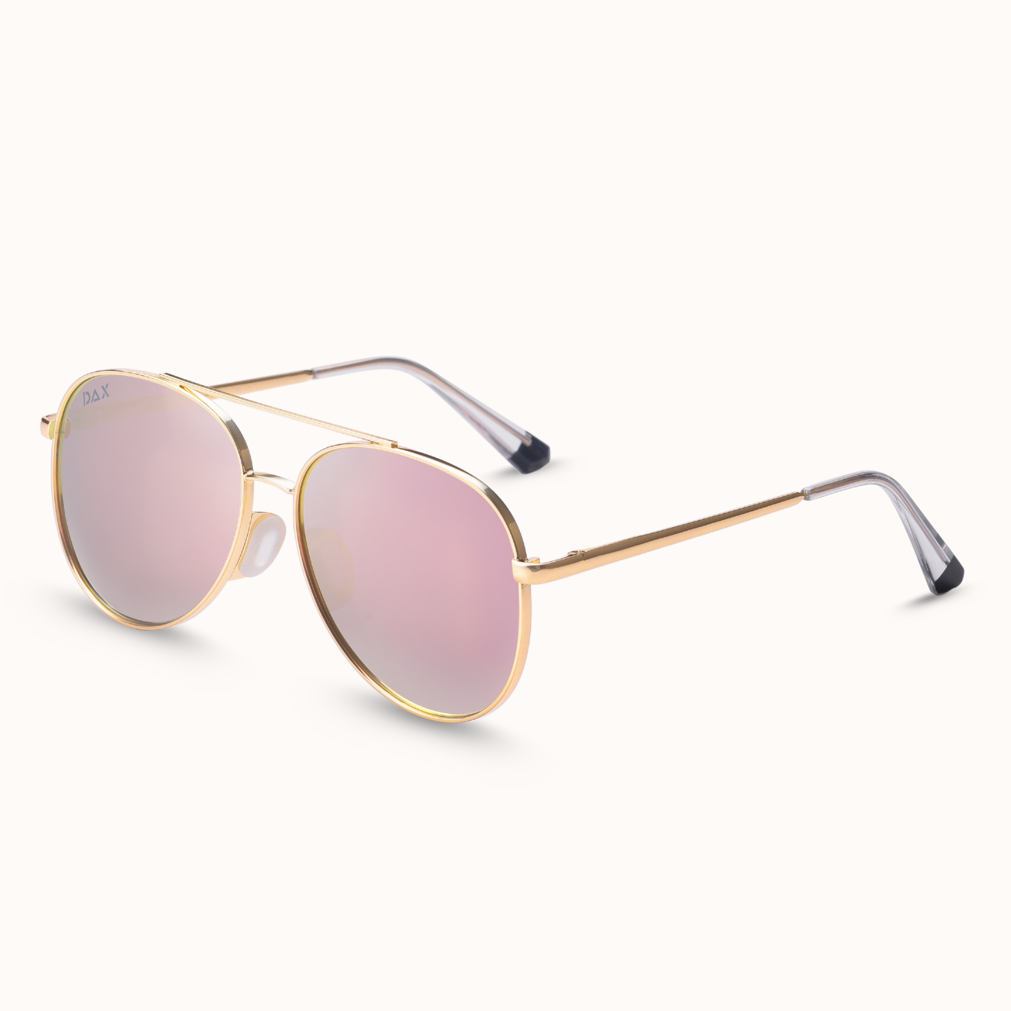 Gold-framed sunglasses with pink lenses on a white background