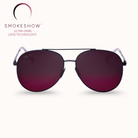 Sunglasses with red gradient lenses on a white background, featuring the Smokeshow brand.