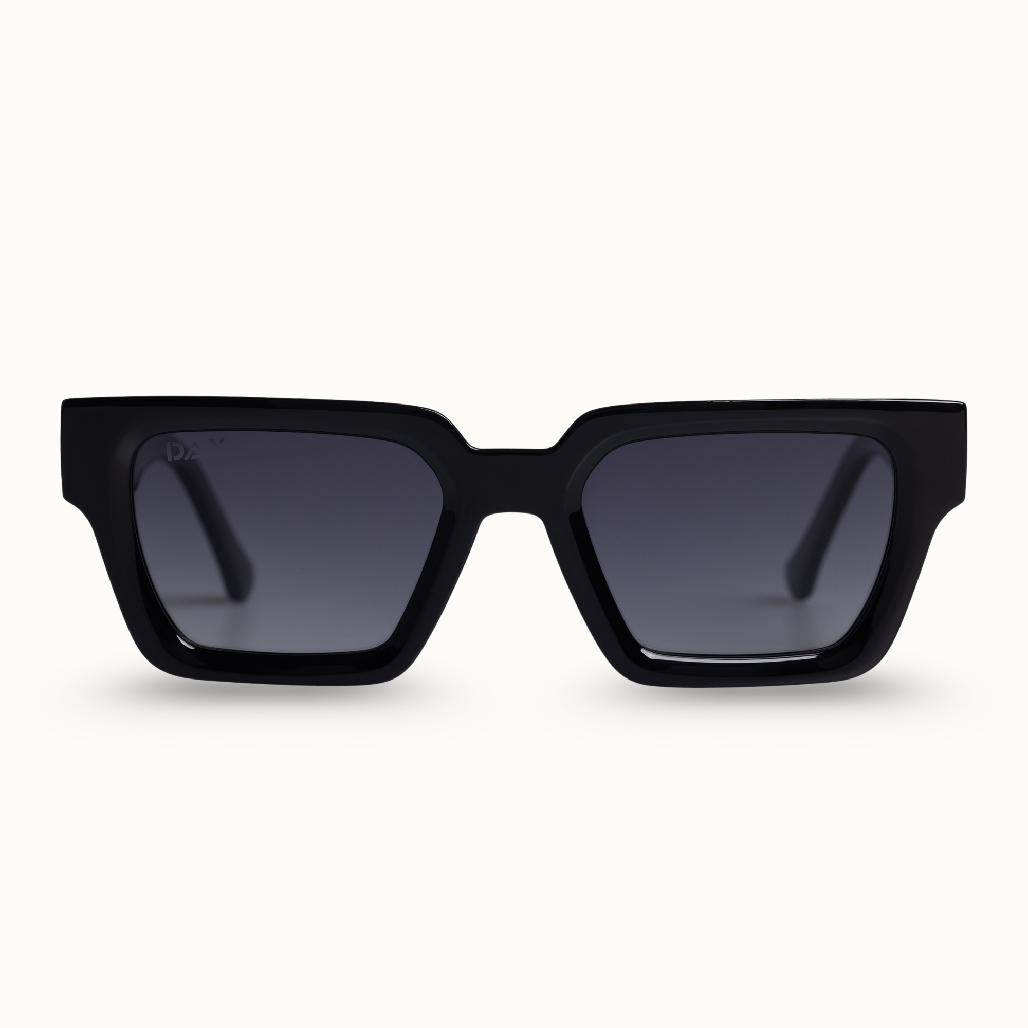 Black sunglasses with dark lenses on a white background