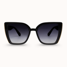 Black sunglasses with gradient lenses on a white background