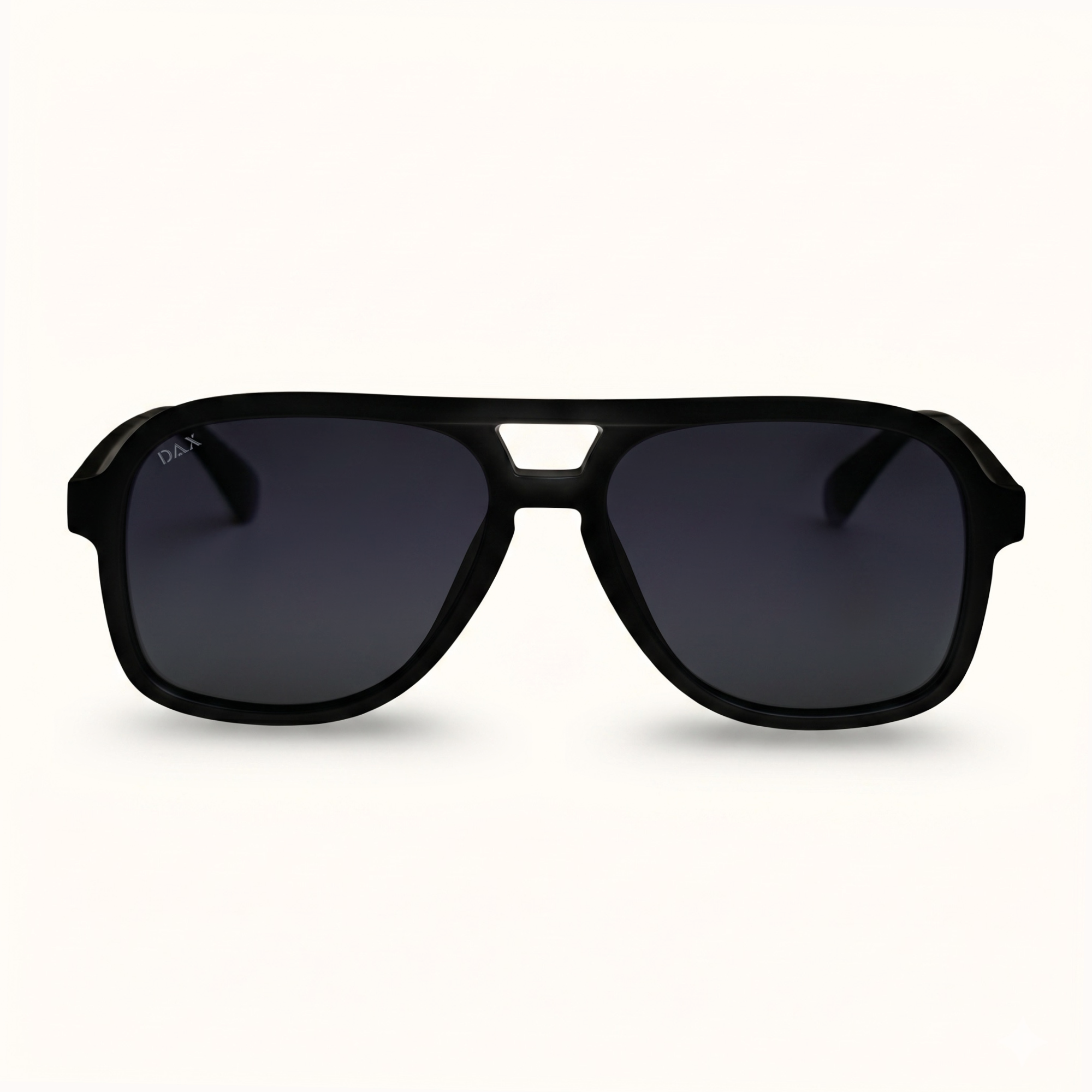 Black sunglasses with dark lenses on a white background