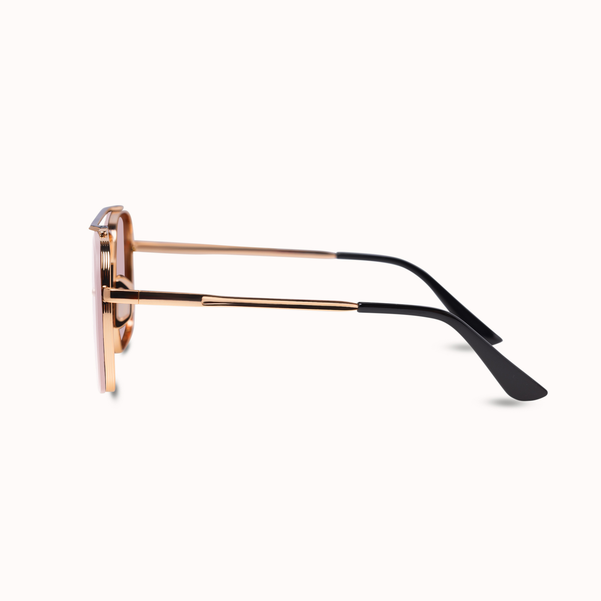 A pair of square-frame sunglasses shown in side profile on a clean white background. The frames are made of rose gold metal, with black temple arms and black temple tips.