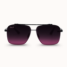 Sunglasses with reddish purple gradient lenses on a white background