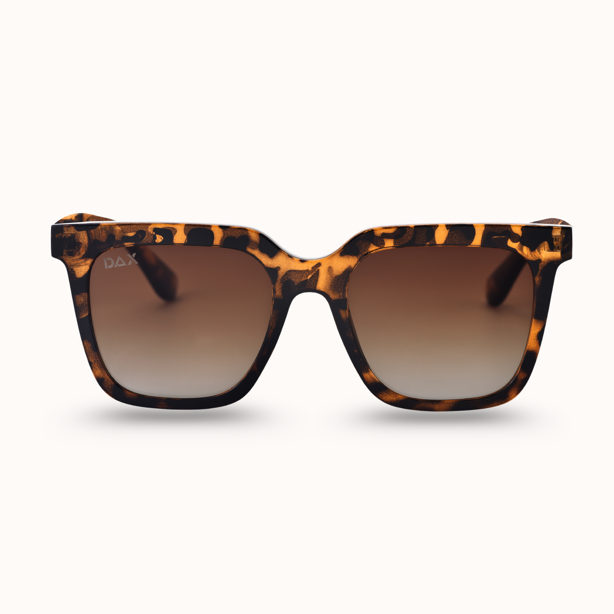 Sunglasses with cheetah frame and gradient lenses on a white background