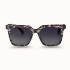 Sunglasses with gray cheetah patterned frame on a white background