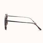 Sunglasses with tortoiseshell frame on a white background