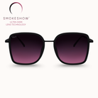 Black sunglasses with purple gradient lenses on a white background, featuring the Smokeshow brand.