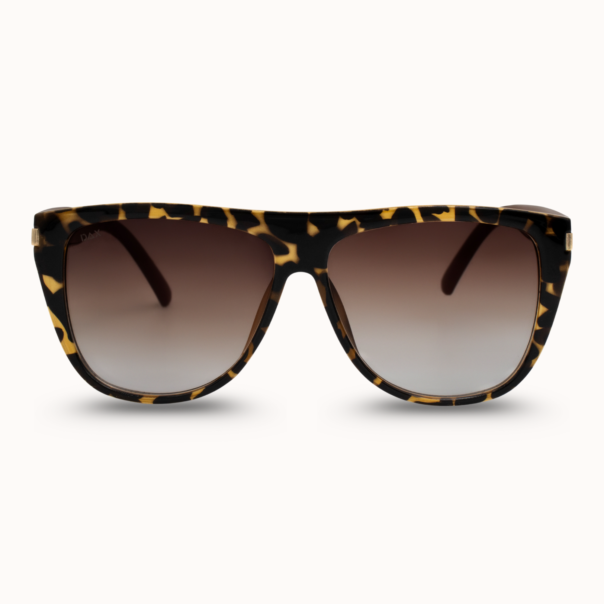 Sunglasses with leopard print frame and brown gradient lenses on a white background