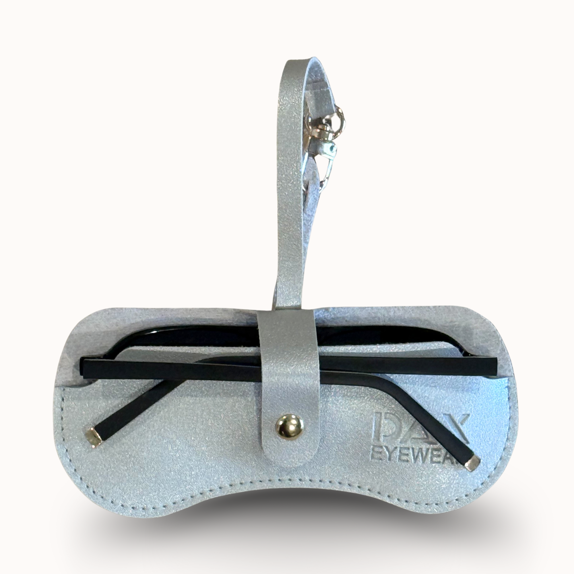 Silver eyewear case with black glasses on a white background