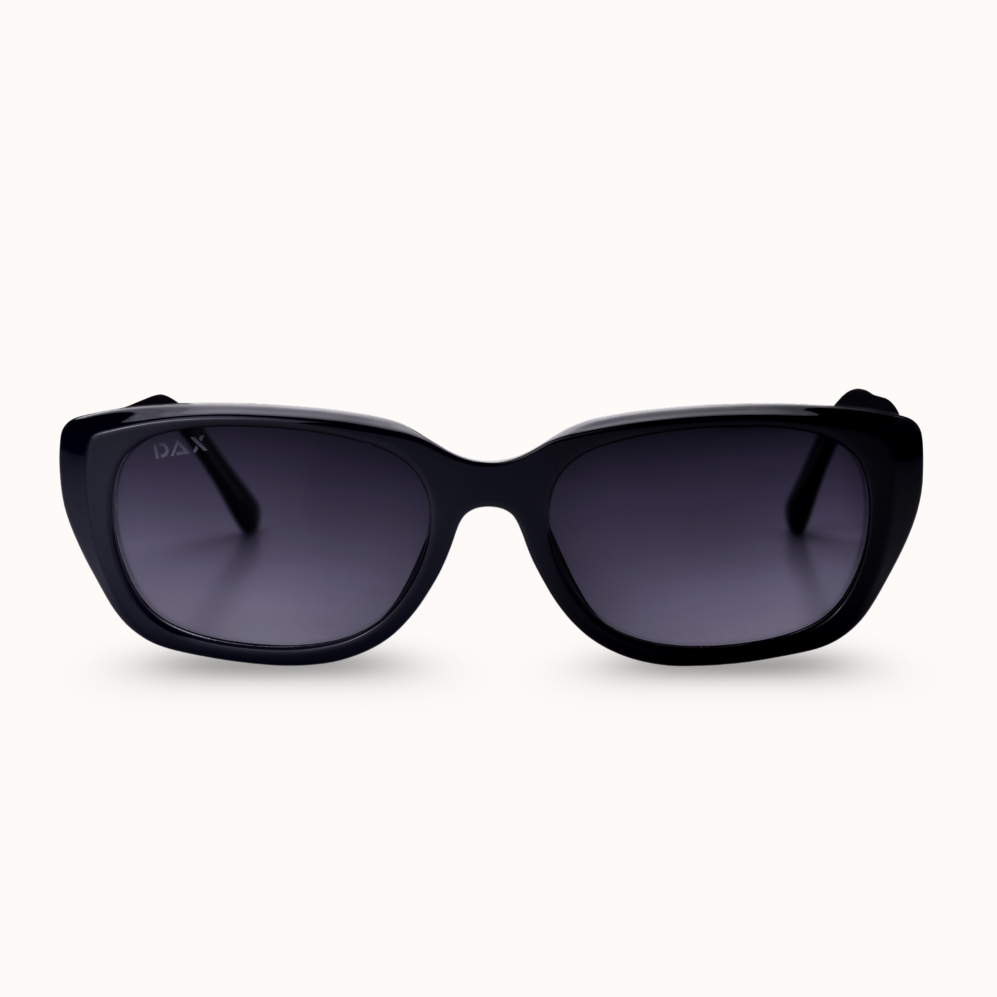 Black sunglasses with dark lenses on a white background