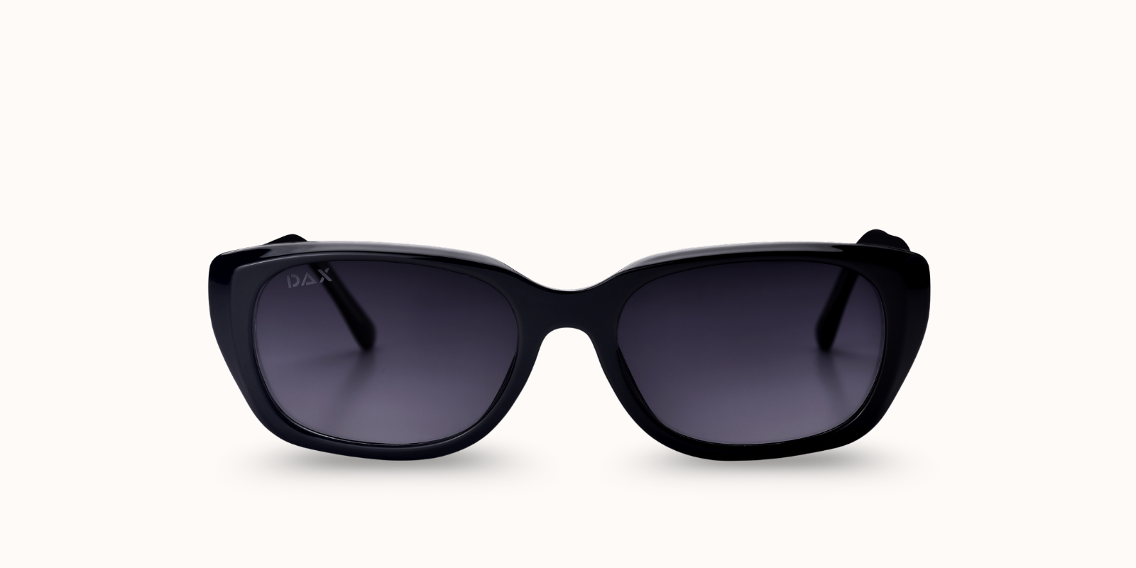 Black cat eye sunglasses with dark lenses on a white background