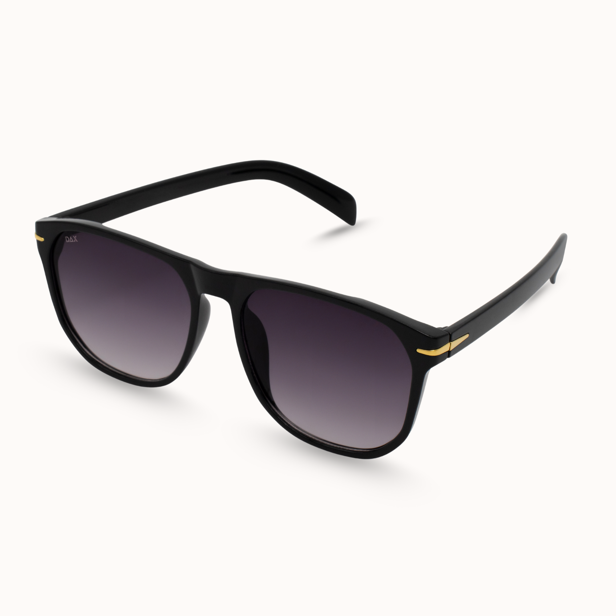 Black sunglasses with gold accents on a white background