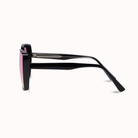 Black square sunglasses with pink mirrored lenses, shown in a side profile view on a clean white background.