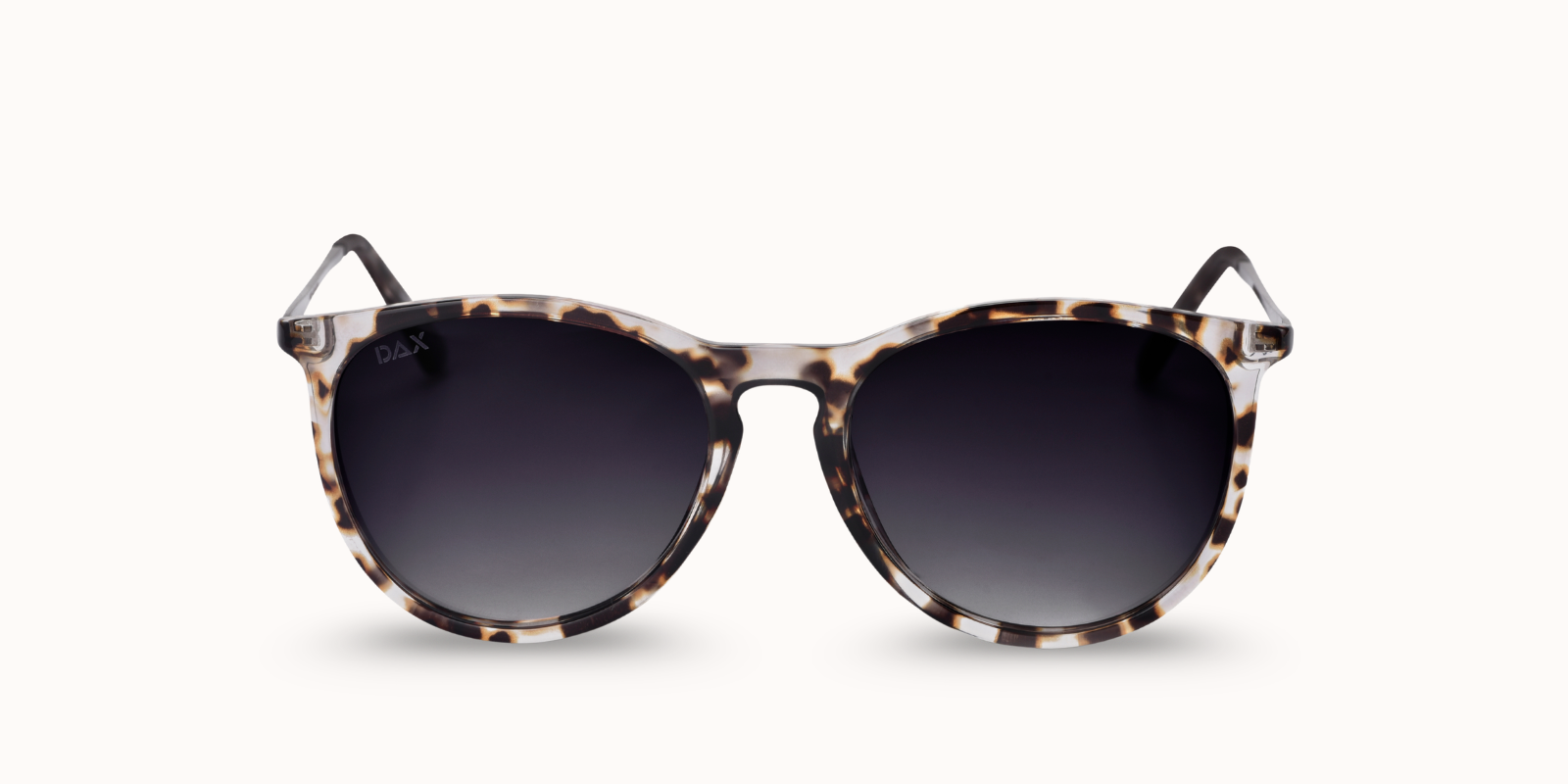 Sunglasses with tortoiseshell frame and dark lenses on a white background