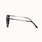 Sunglasses with reflective lenses on a white background