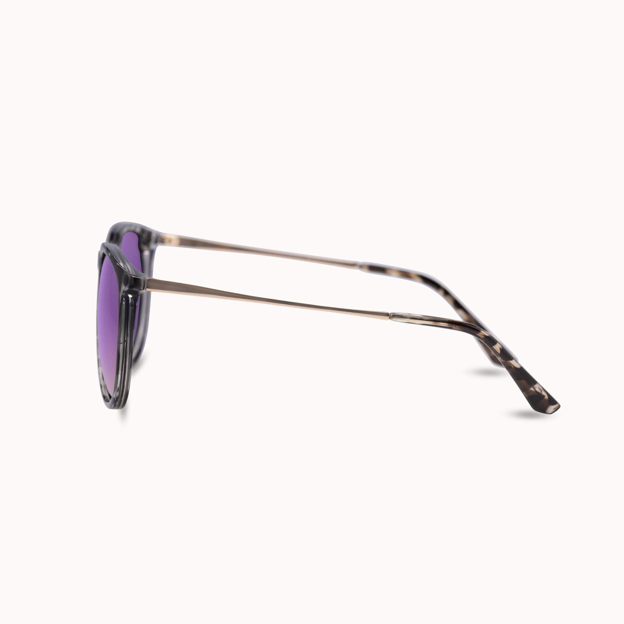 Side profile of a pair of sunglasses with a dark tortoiseshell frame and purple tinted lenses, shown on a clean off-white background.