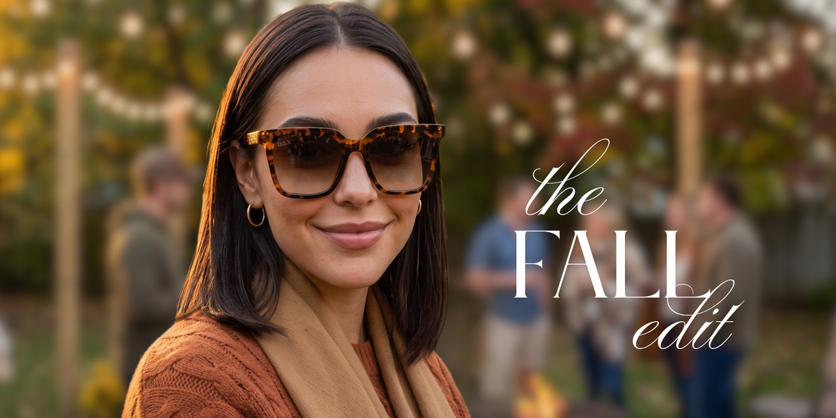 A woman wearing brown, tortoise shell frames in an autumn setting.